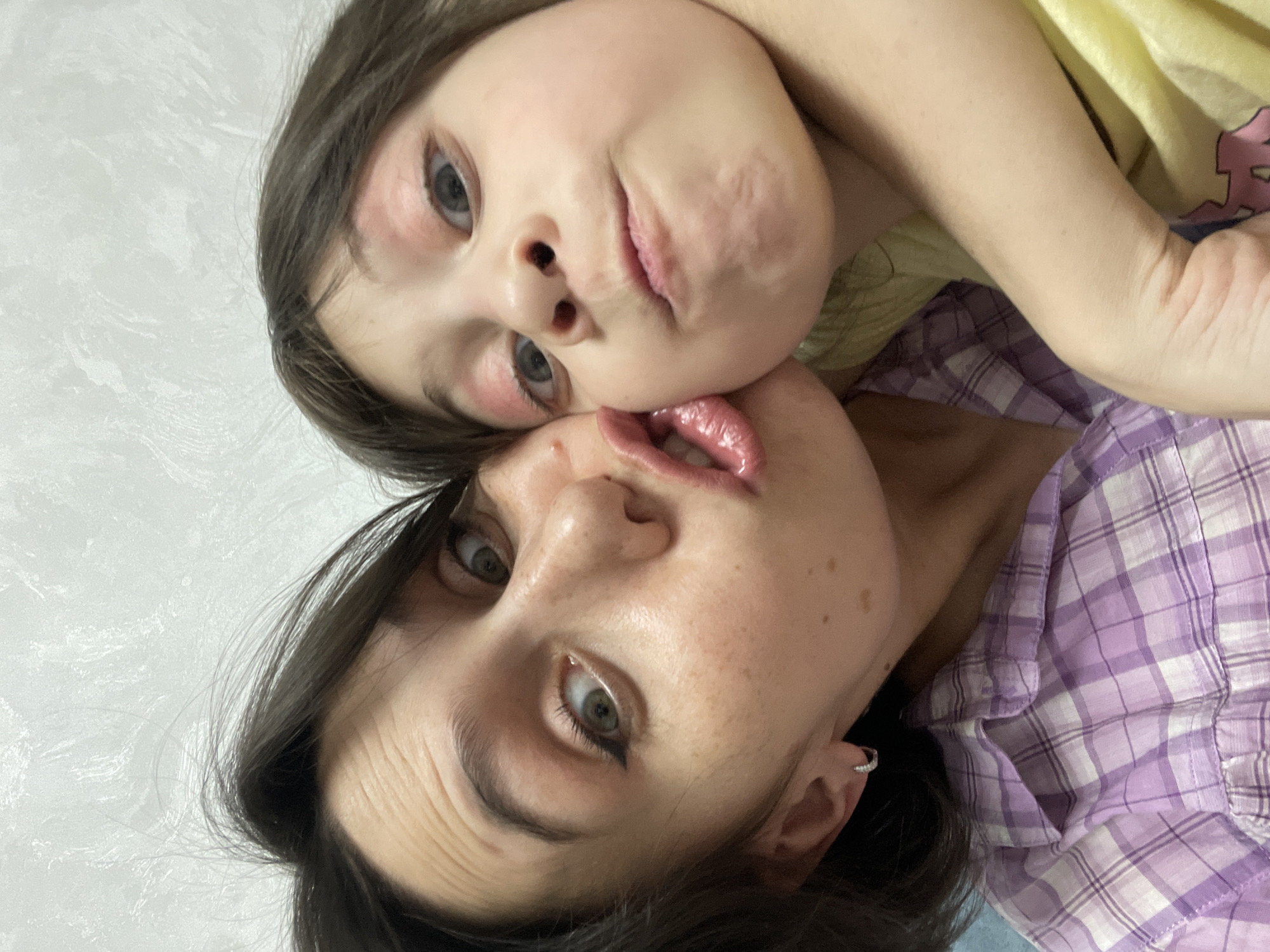 Mother and daughter share intimate moments in Izhevsk home
