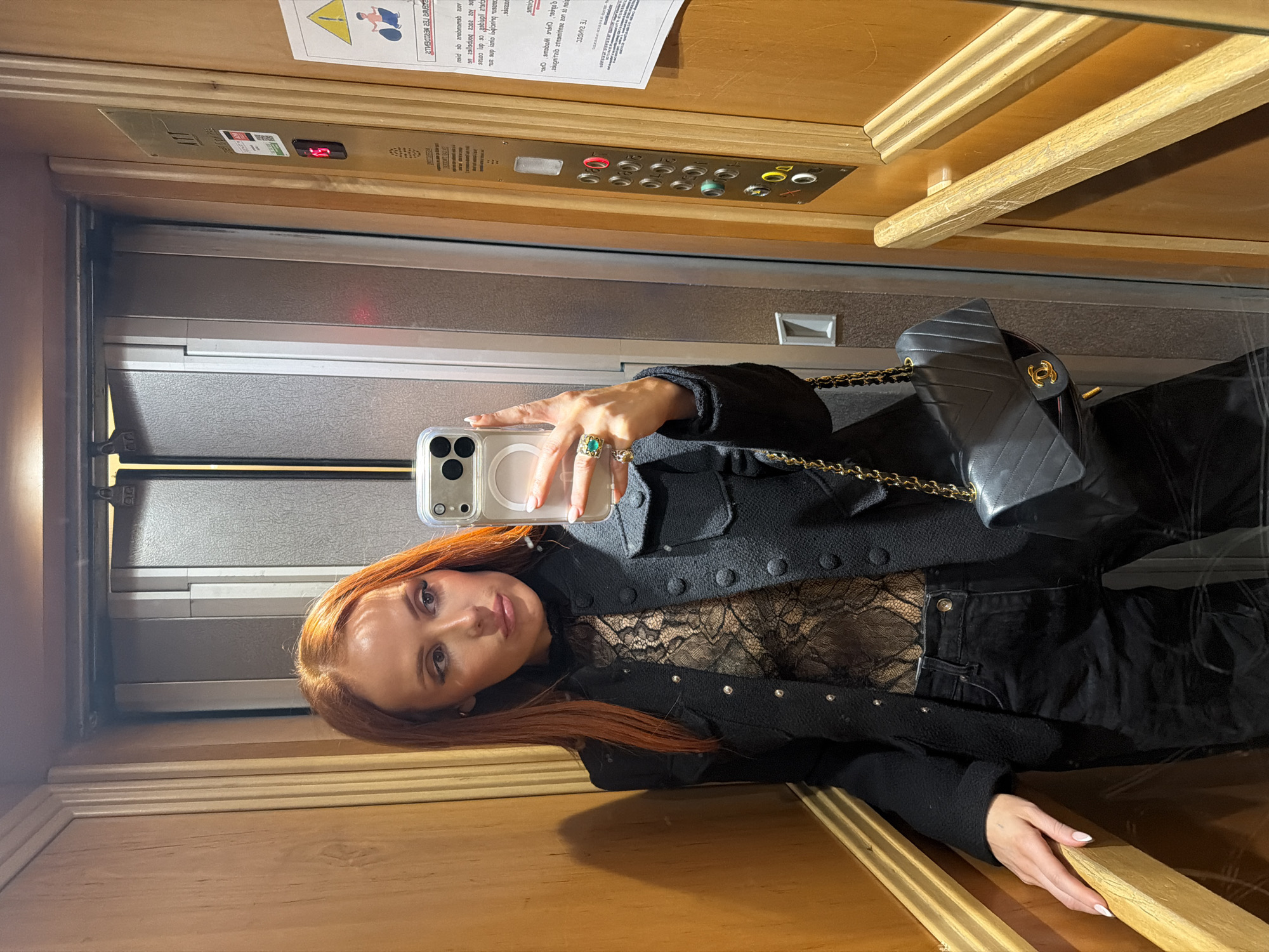 Woman Takes Selfie in Paris Elevator