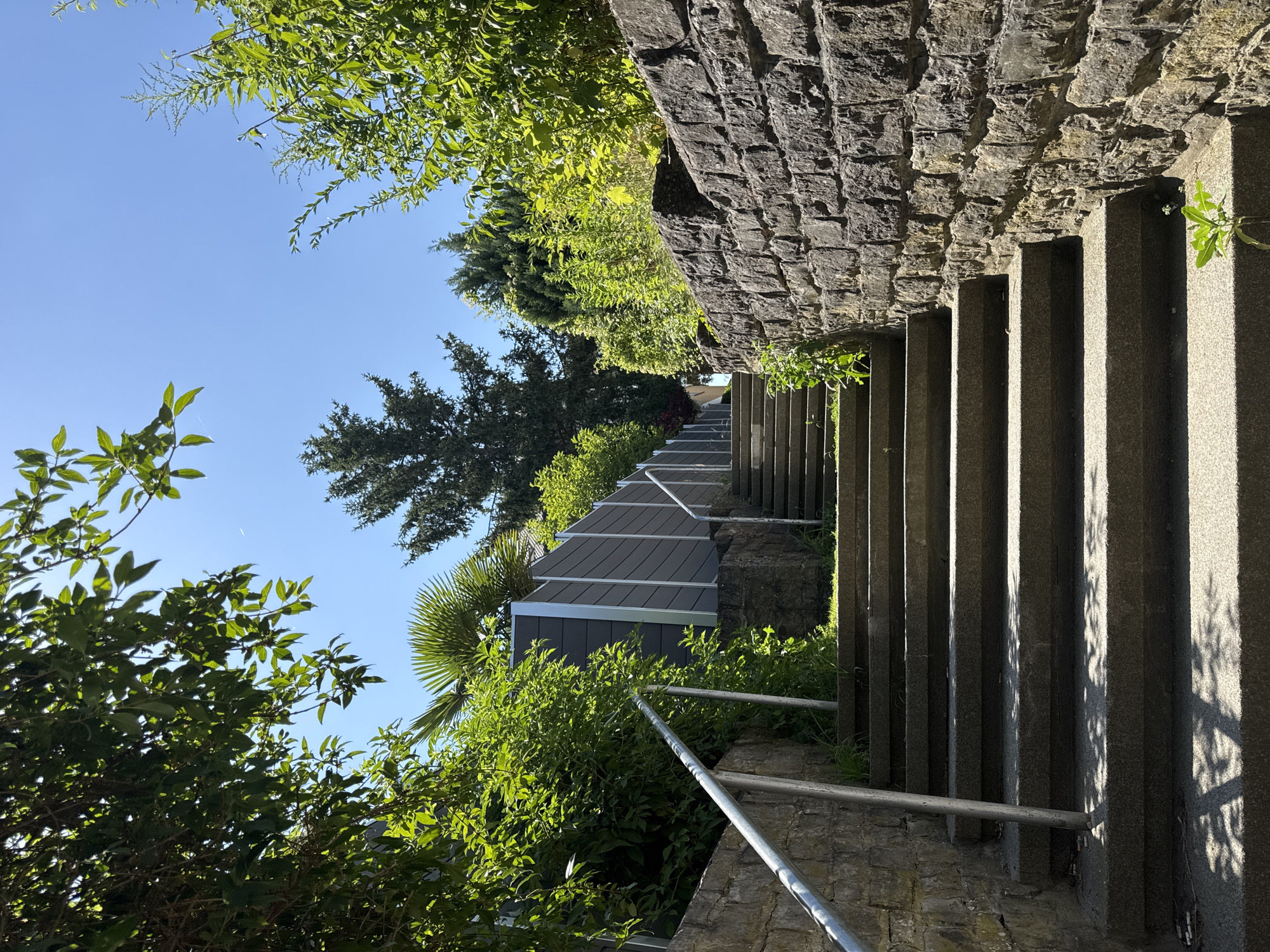 Stone stairs and a rusty weather vane in Bietigheim-Bissingen greenery