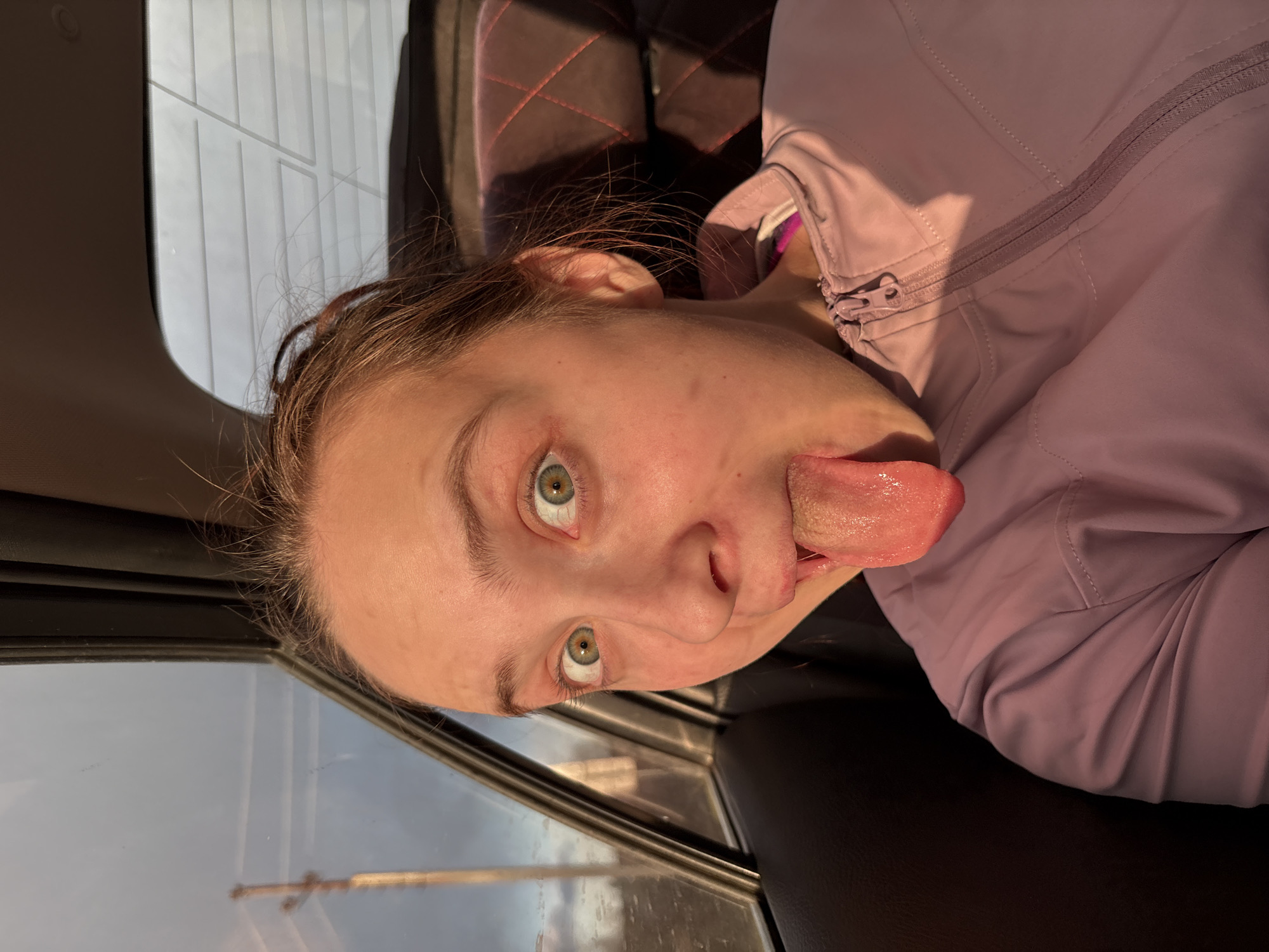 Woman photographed resting inside vehicle in Kazan, Russia