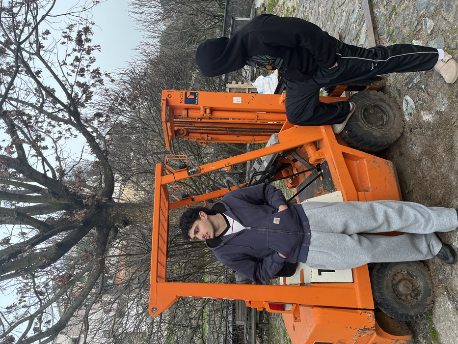 Young adults explore Bragança Portugal sites during March evening