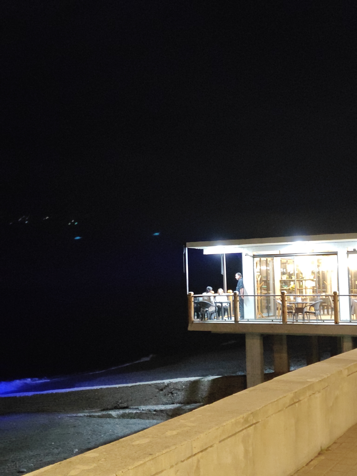 Nighttime scenes documented across illuminated Kobuleti waterfront district