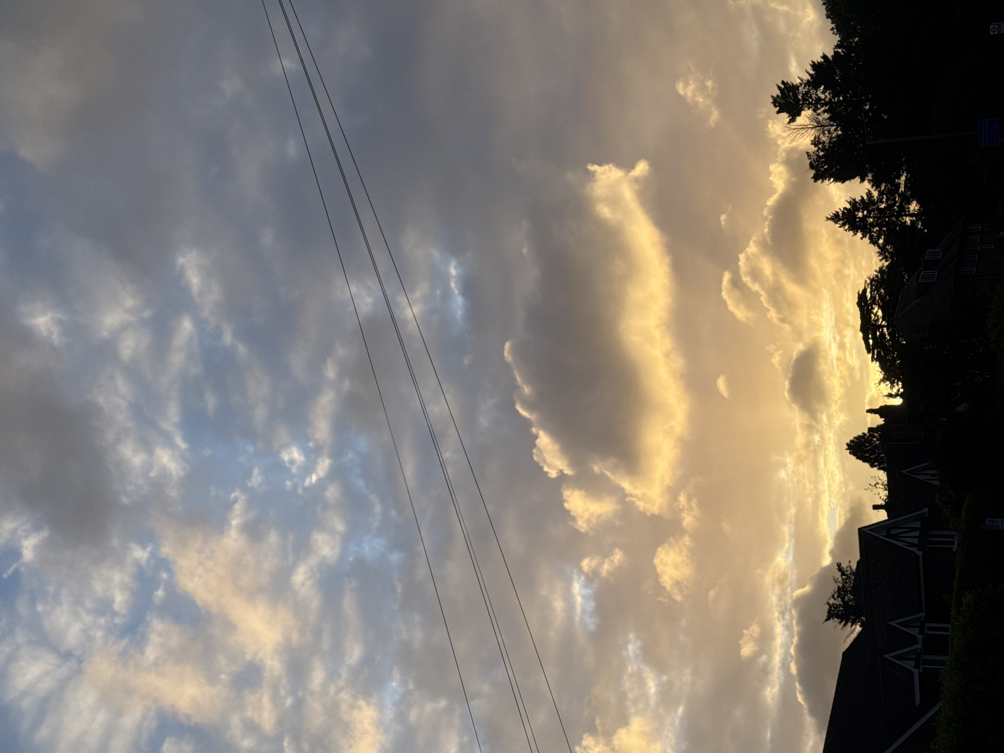 Evening sky with golden clouds observed in London