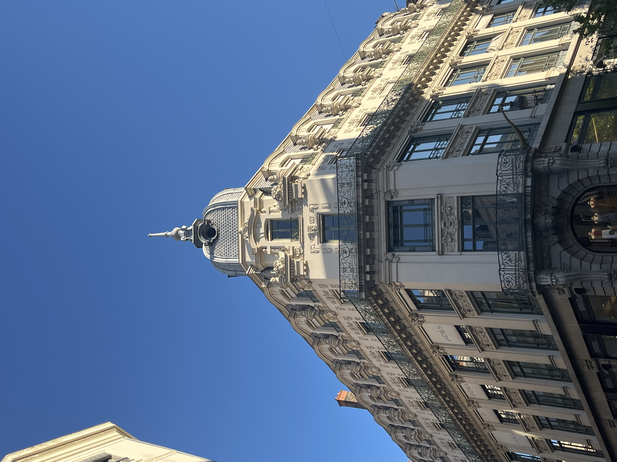 Ornate white building with dome documented in Lyon