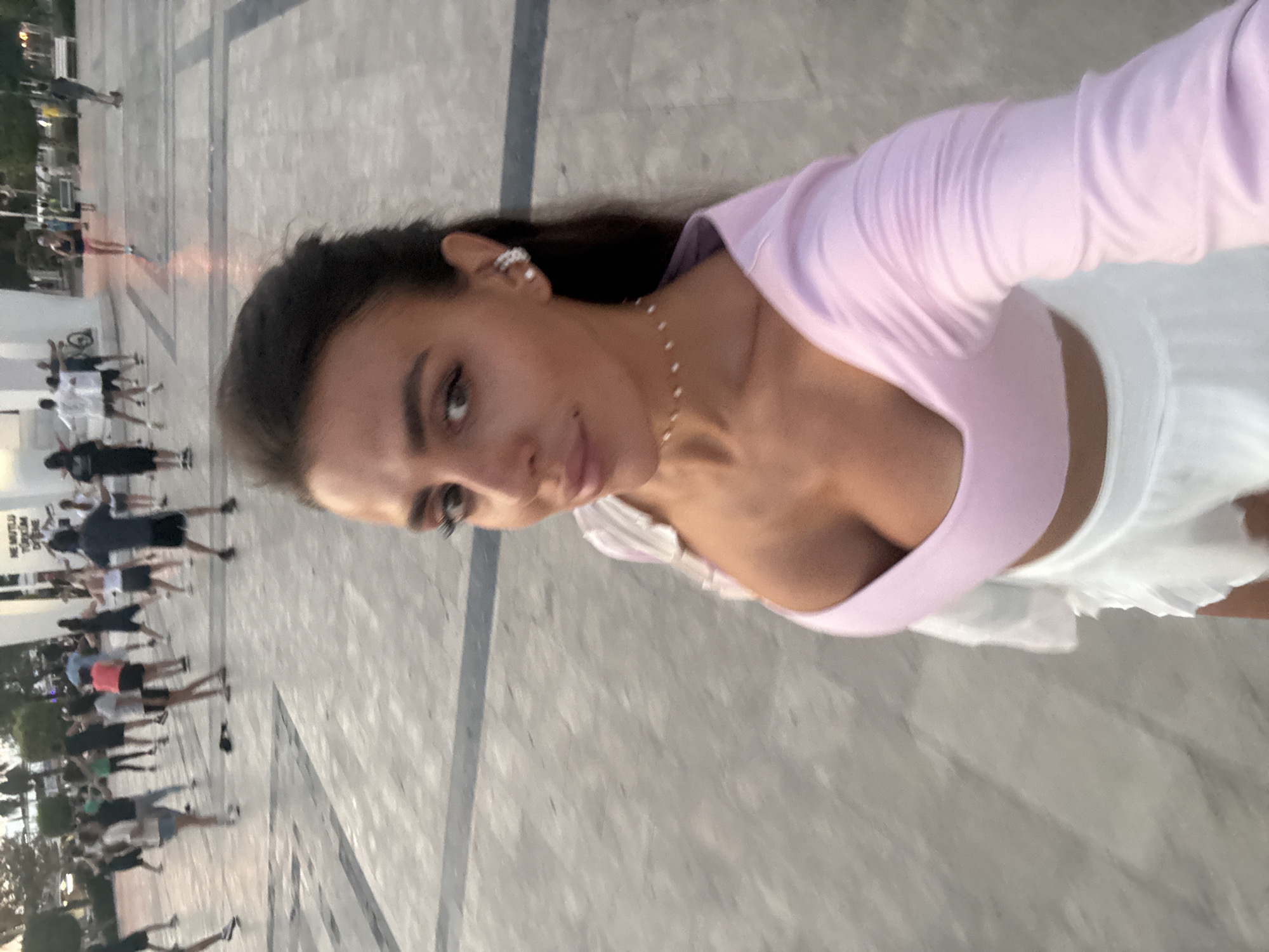 Selfies and an outdoor fitness class share a Fethiye plaza