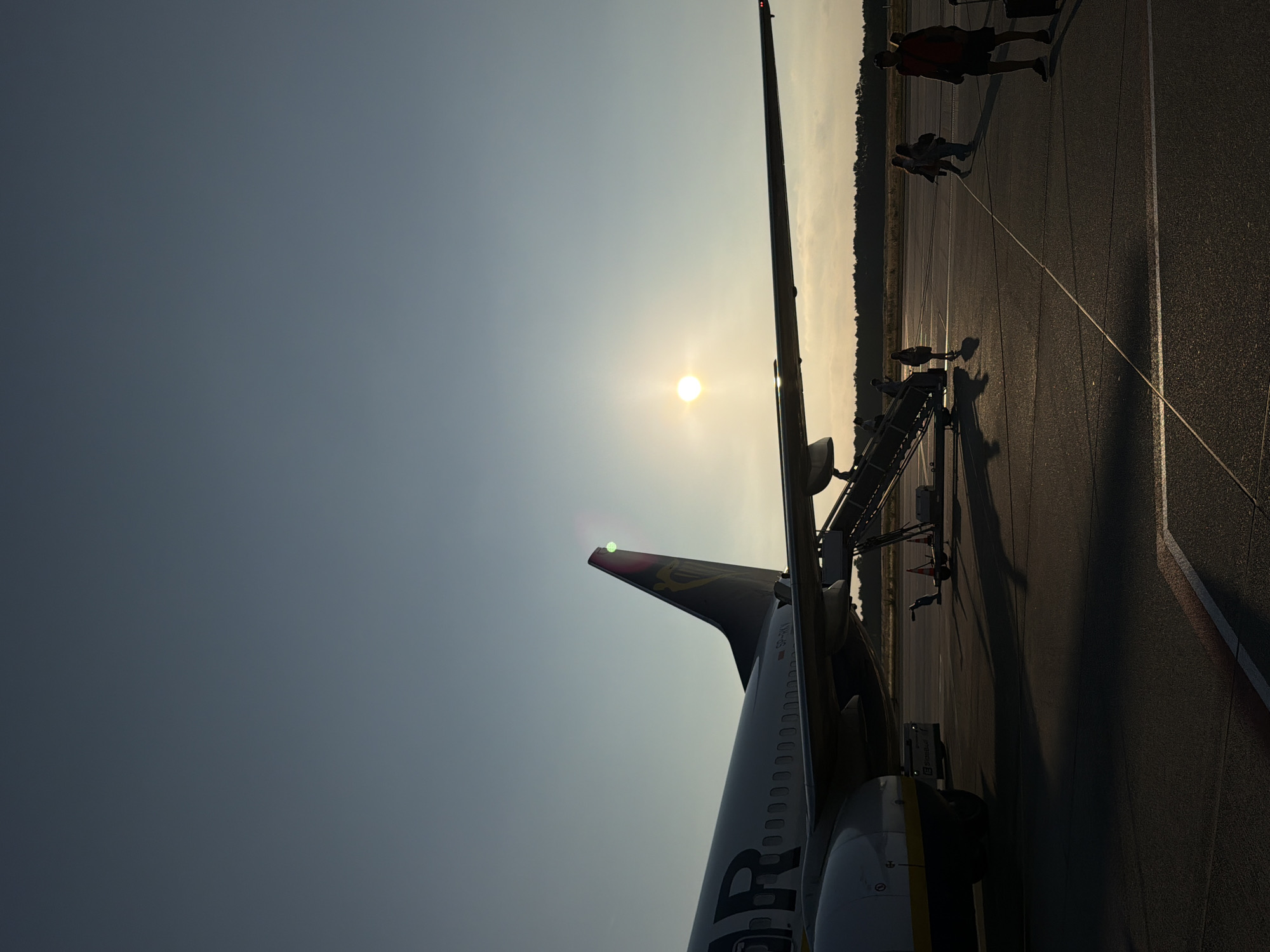 Ryanair flight arrives at Eindhoven Airport at golden hour