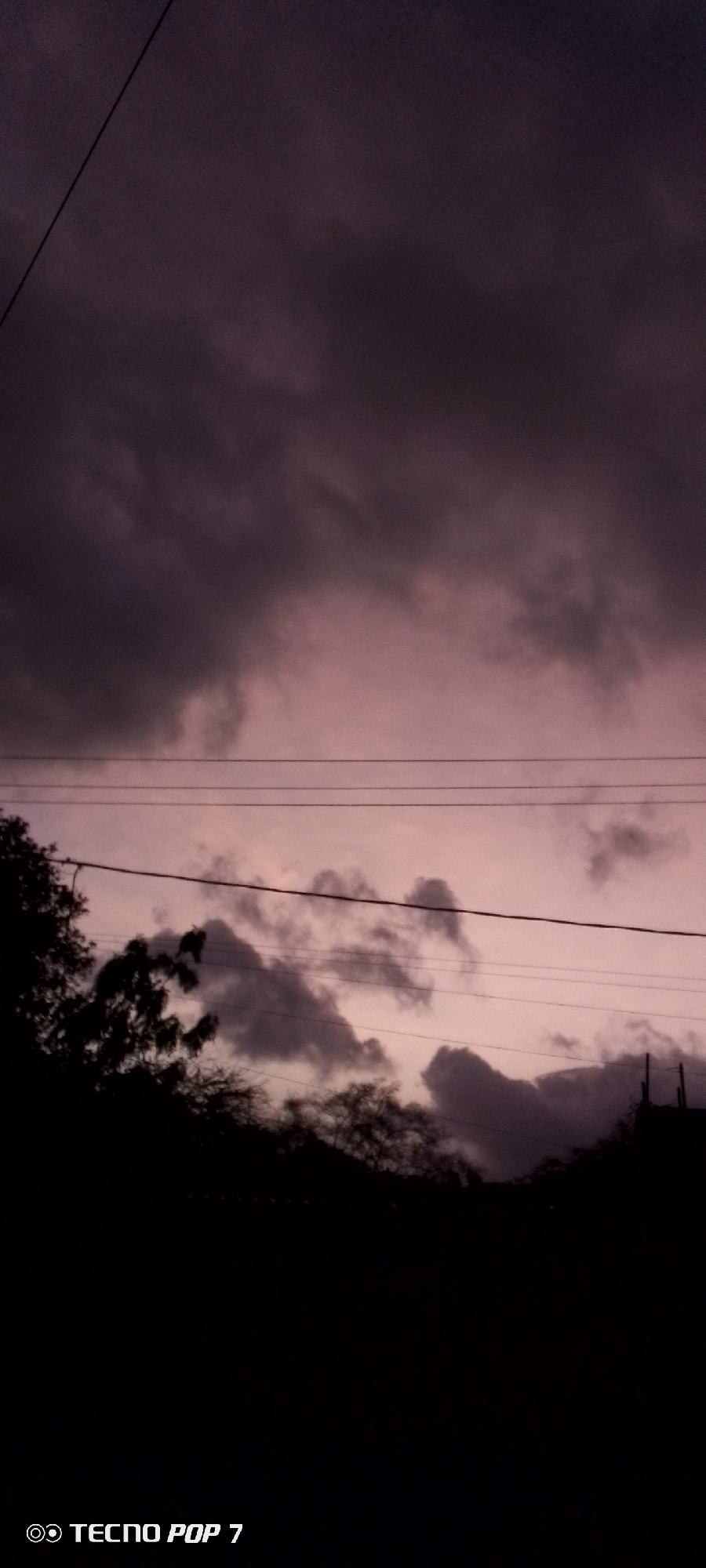 Dramatic twilight skies documented over Altagracia, Venezuela residential area