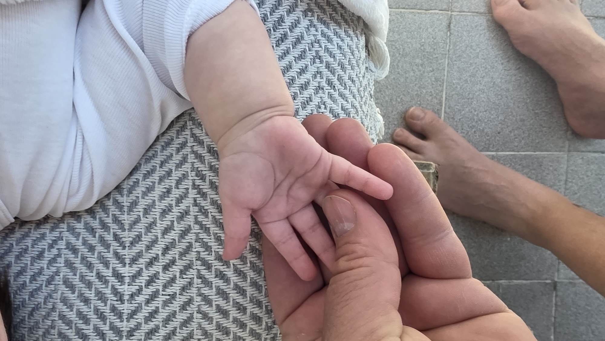 Personal moments captured in Blagoevgrad: baby's tender touch, mirror selfie