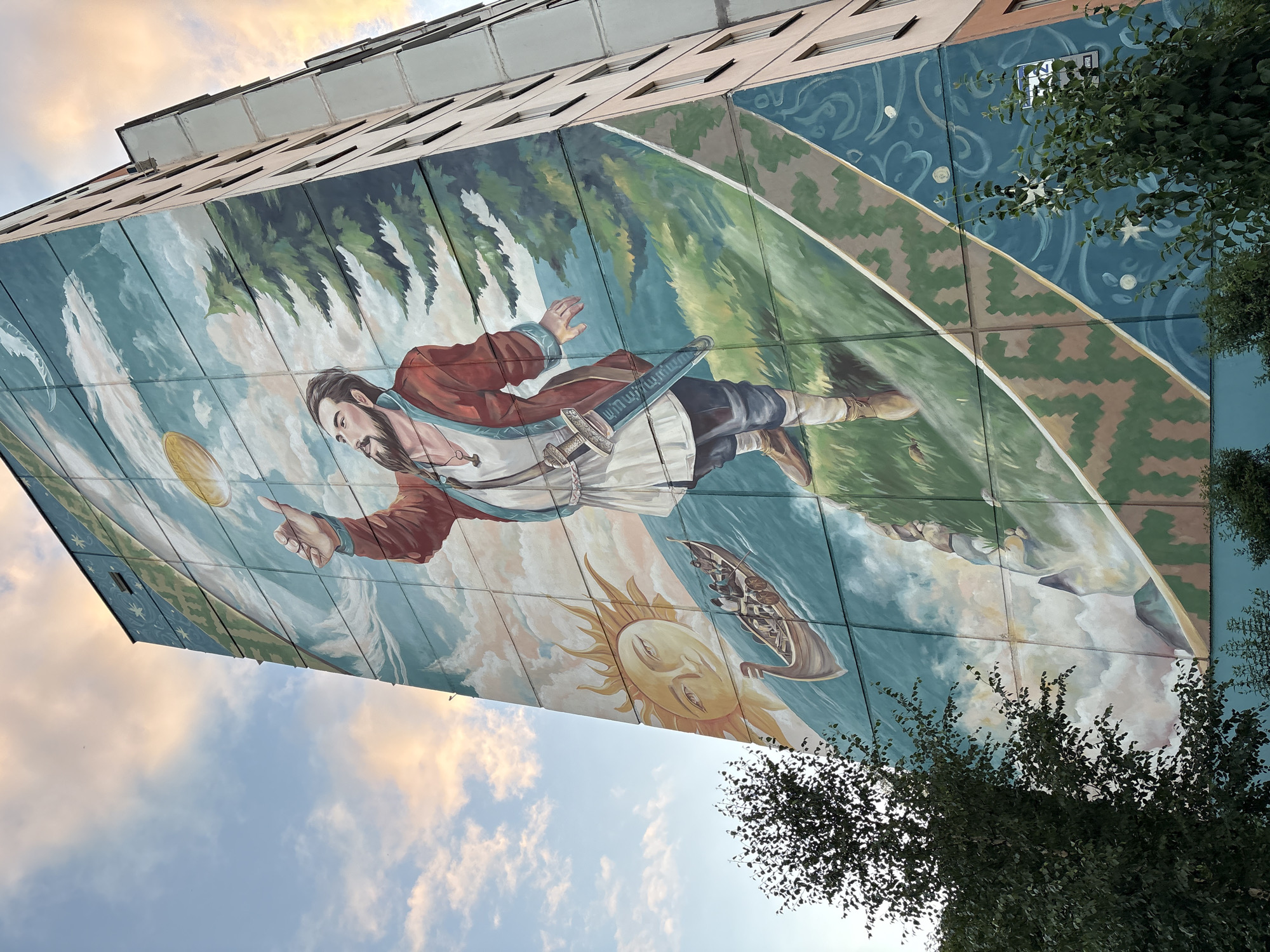 Vitsebsk neighborhood at golden hour, murals and courtyards