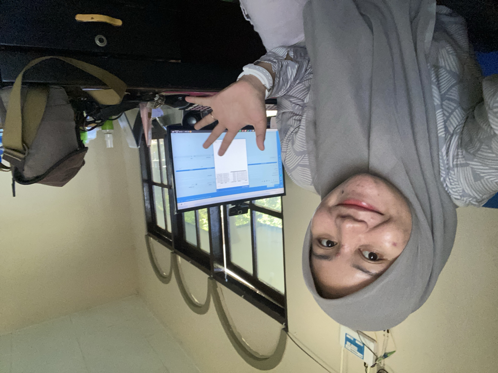 Selfie series split between office desk and sunny Banjarbaru street