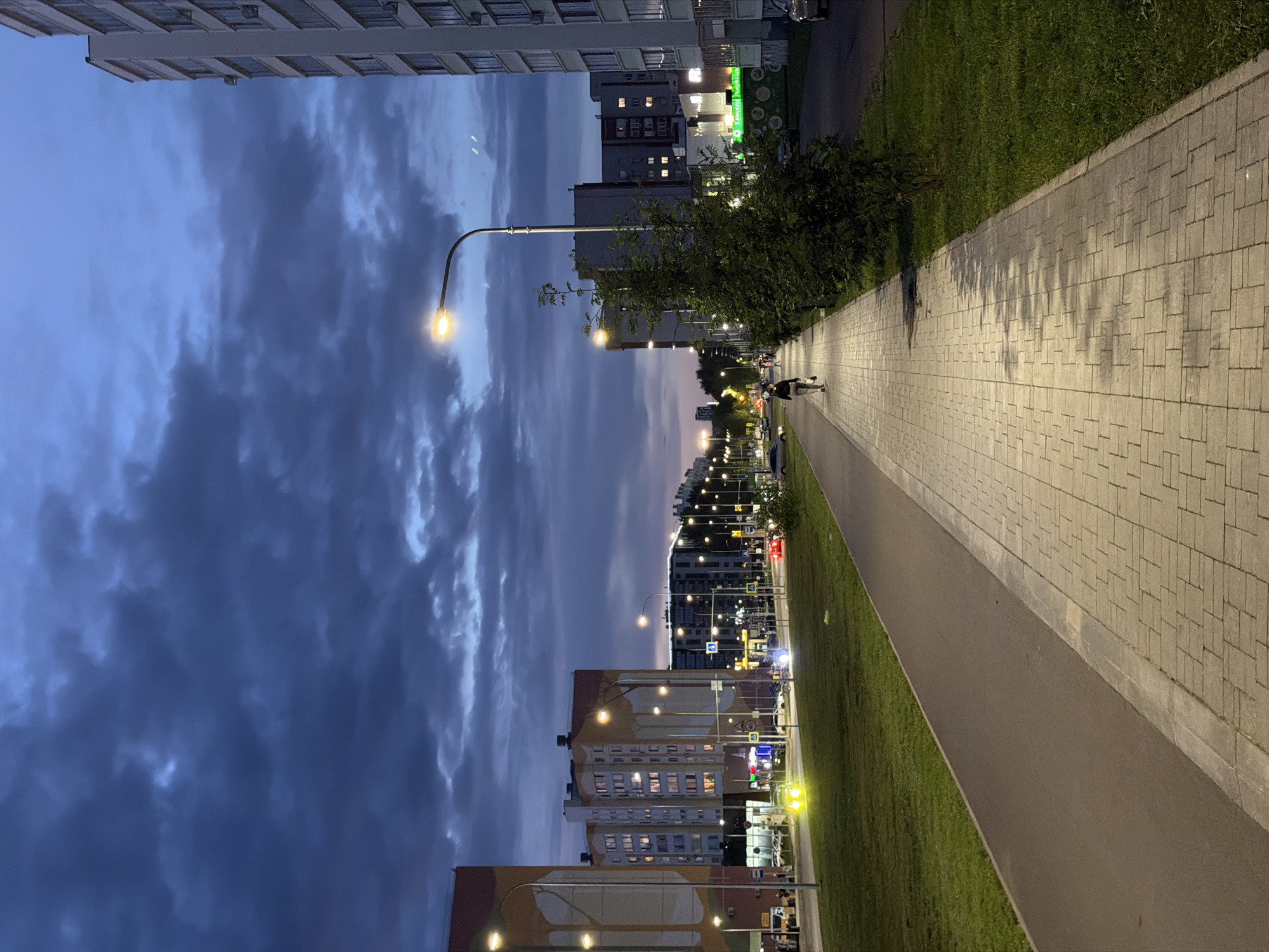 Summer evening in Nizhnekamsk: dramatic skies, street life, and local color
