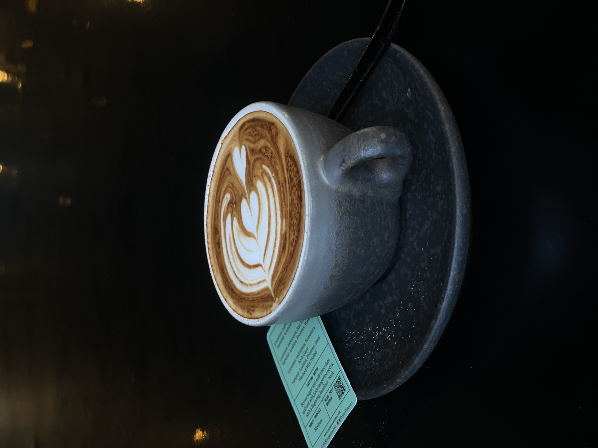 Latte art creation documented at Kuta cafe morning service