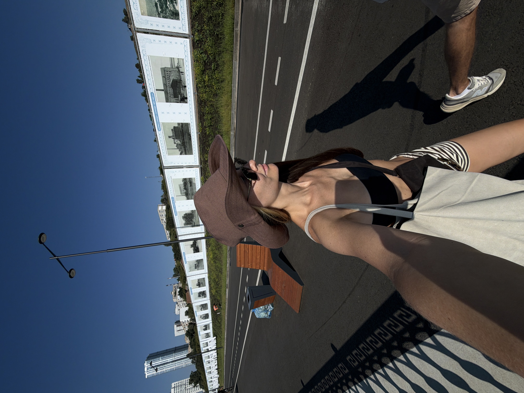 Sunny day selfie in a cowboy hat and beach-ready outfit