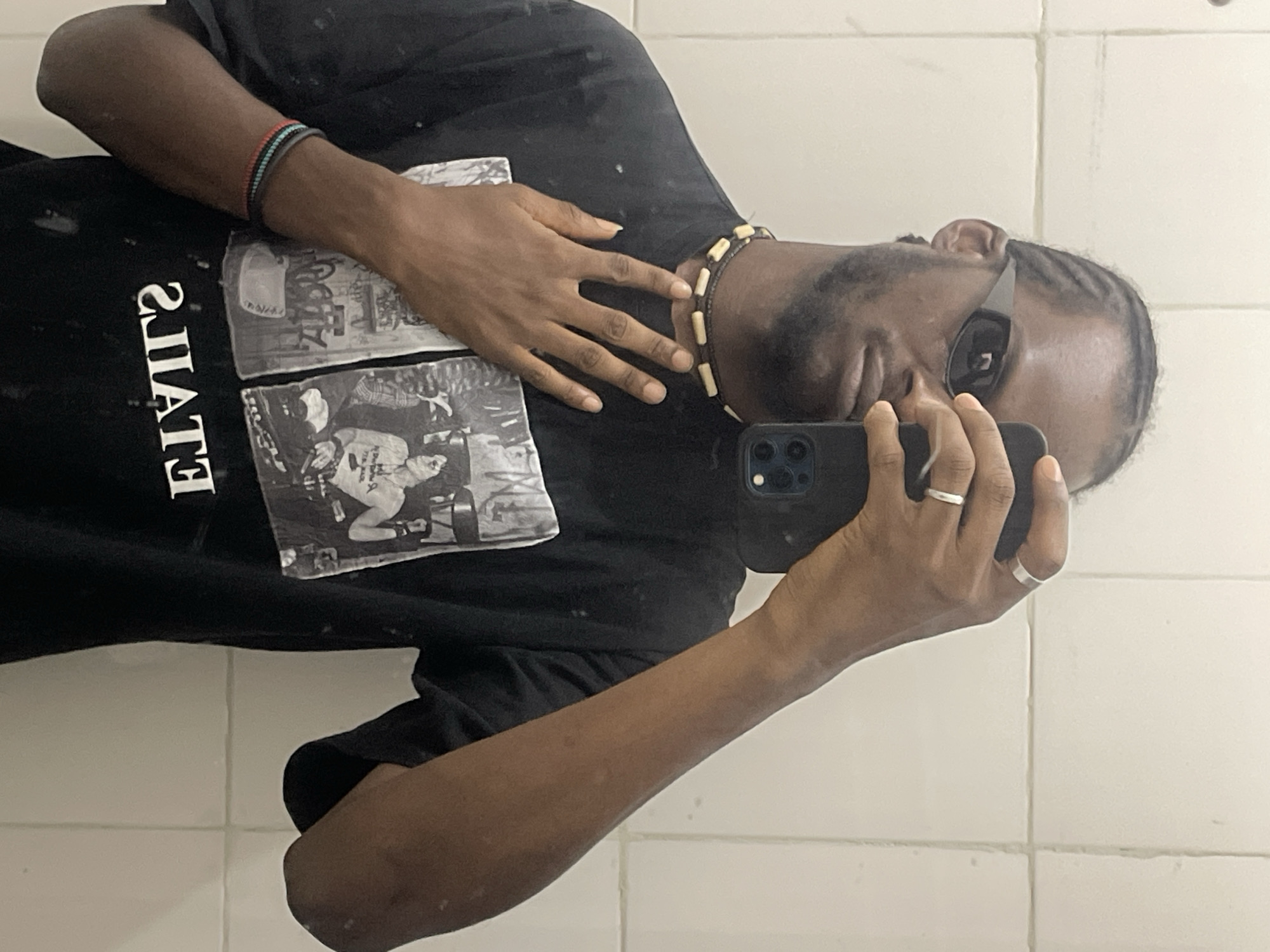 Man takes mirror selfies in Jos, Nigeria