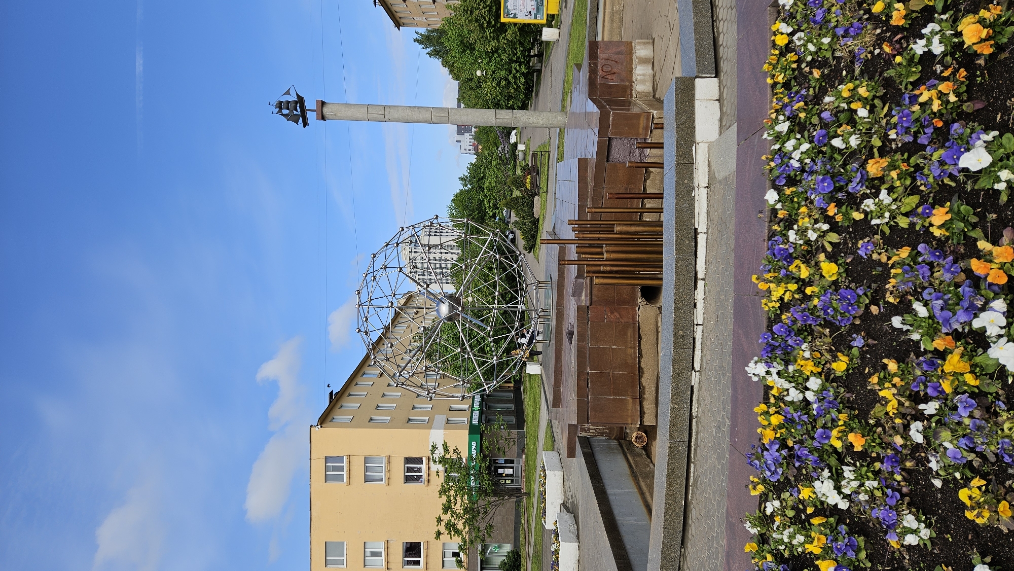 Morning urban walk captures city sculptures and monuments