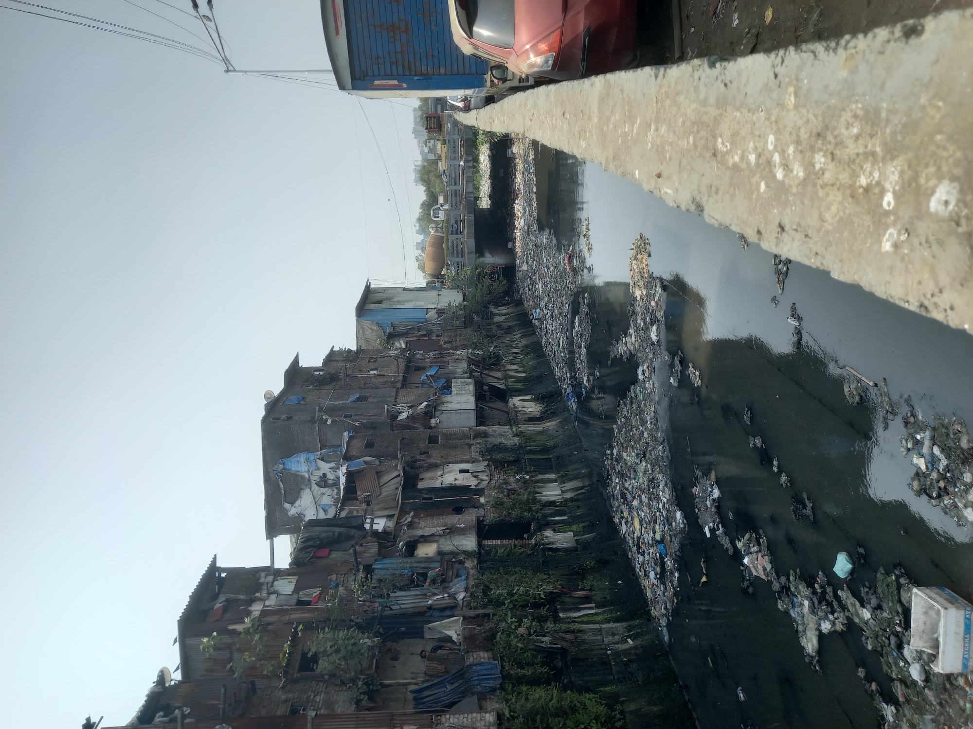 Witnesses document polluted waterways, informal settlements in Mumbai