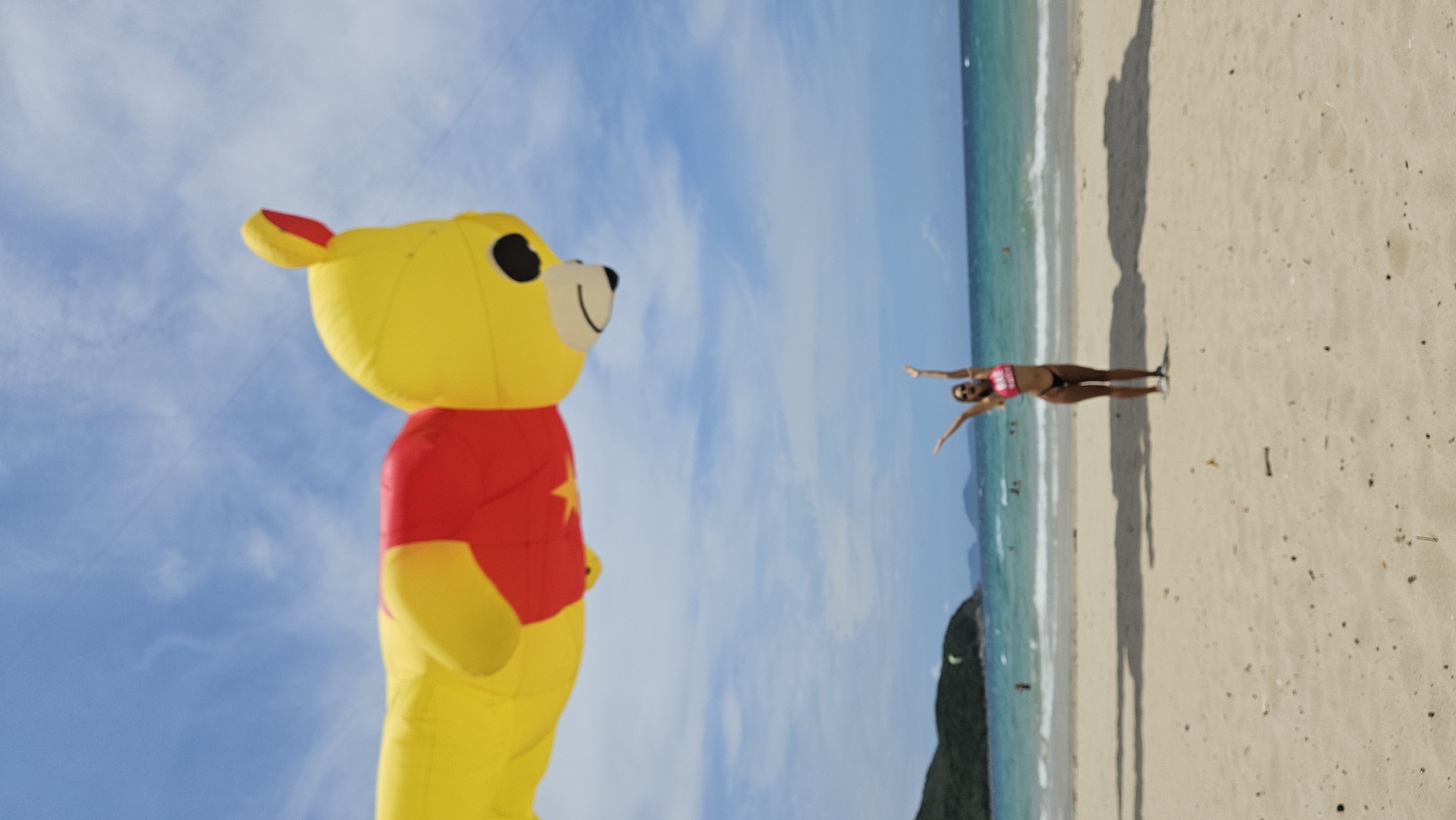 Giant Winnie the Pooh kite flies over Vietnam beach