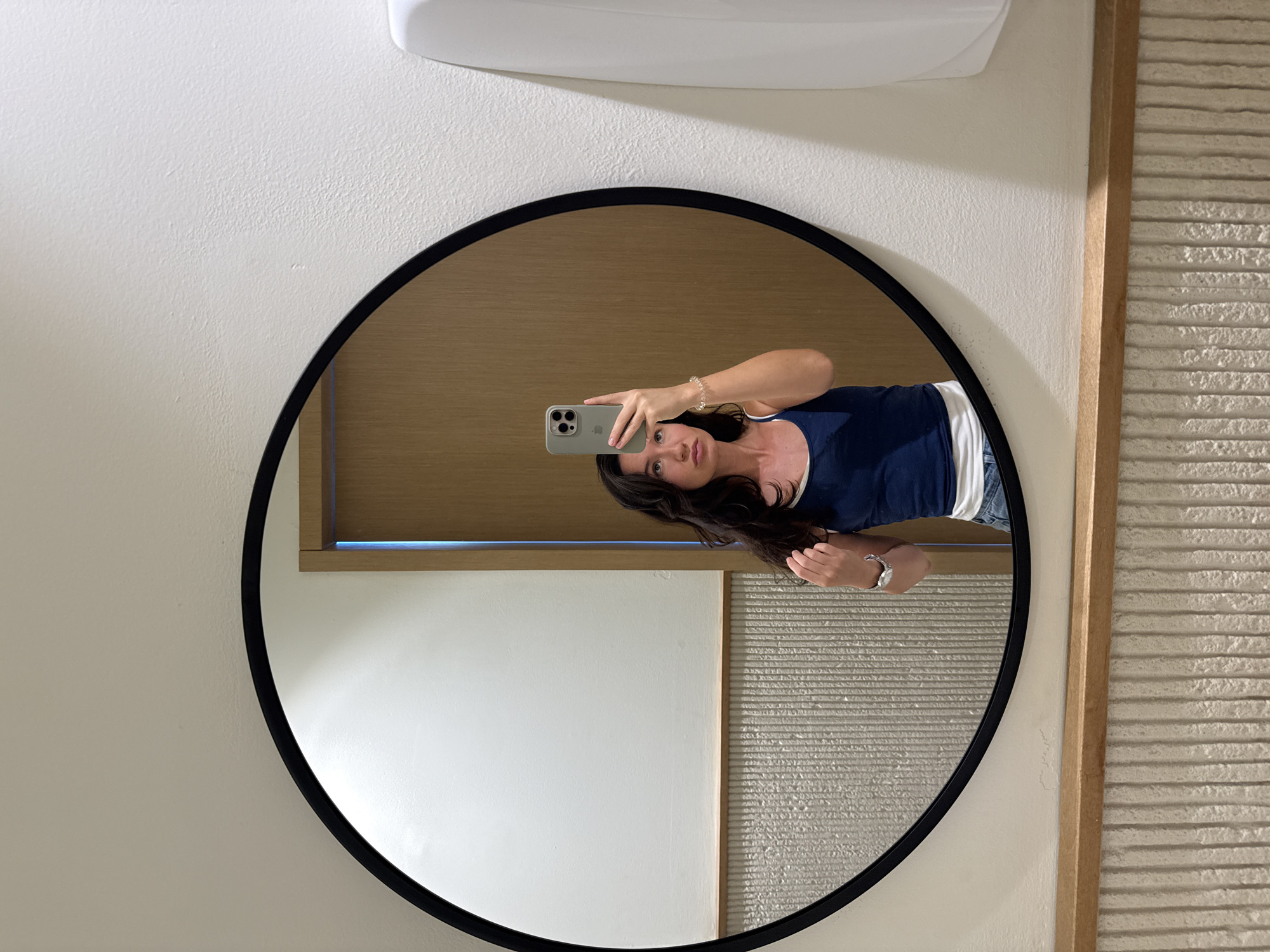 Mirror selfie in a Tel Aviv public restroom