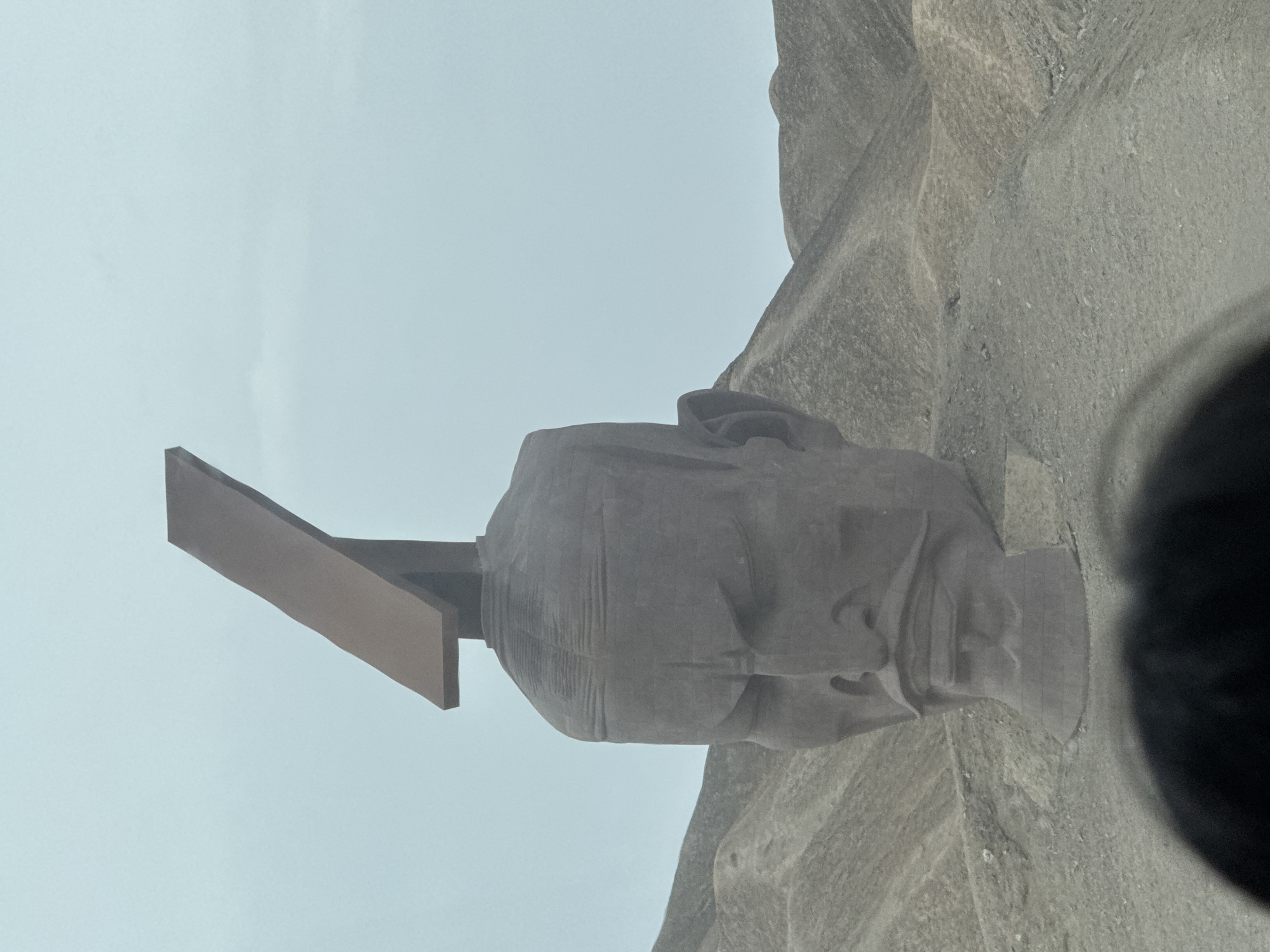 Stone head sculpture observed in Guazhou County, China