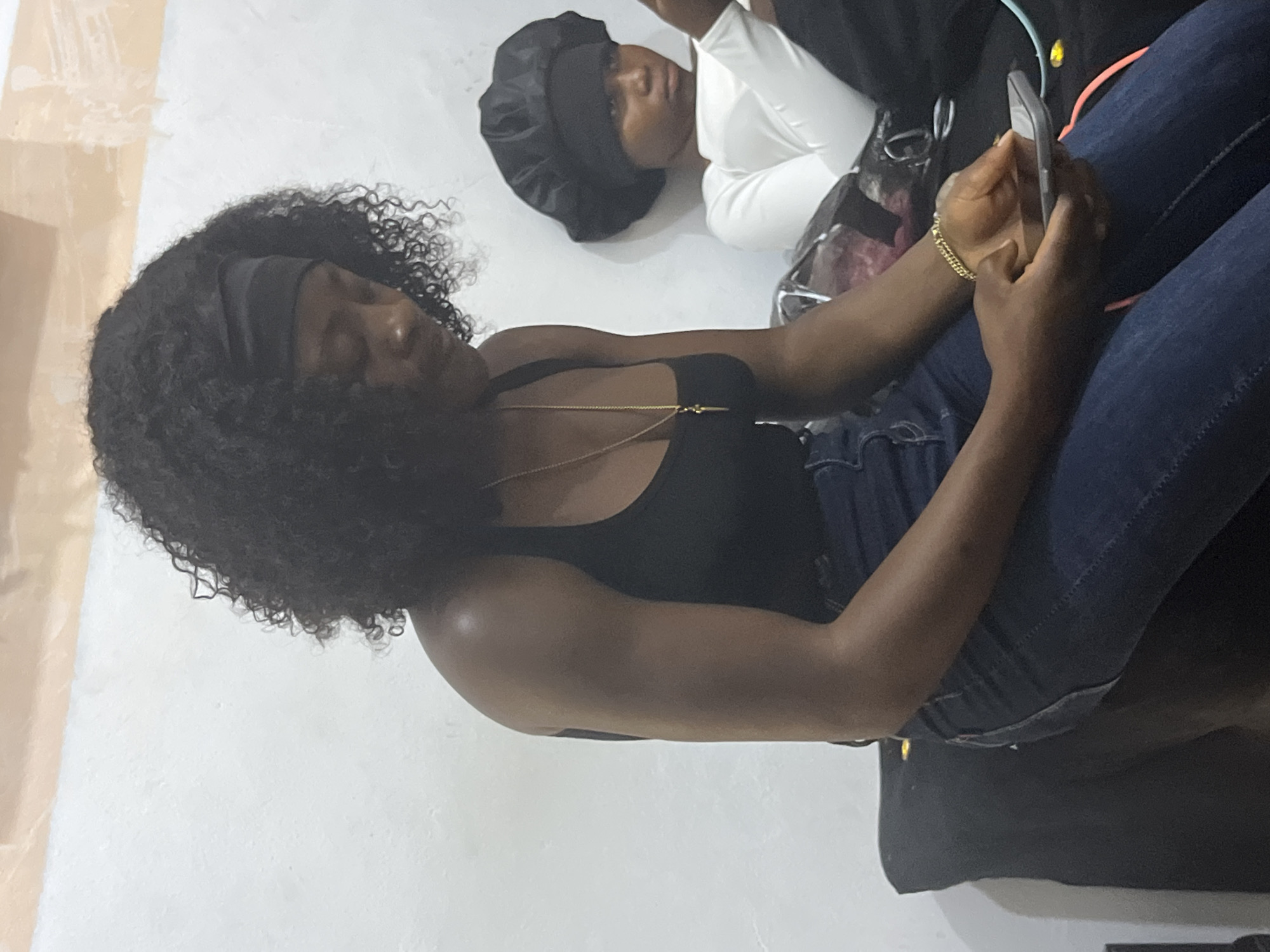 Afternoon hangout at a Jos salon, phones out and nails done