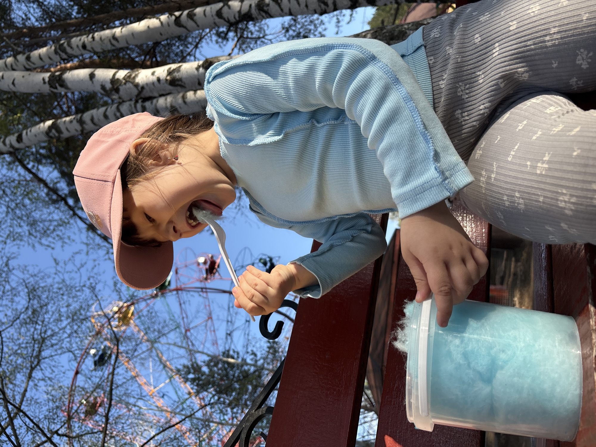 Family enjoys cotton candy, park games in Chaikovsky