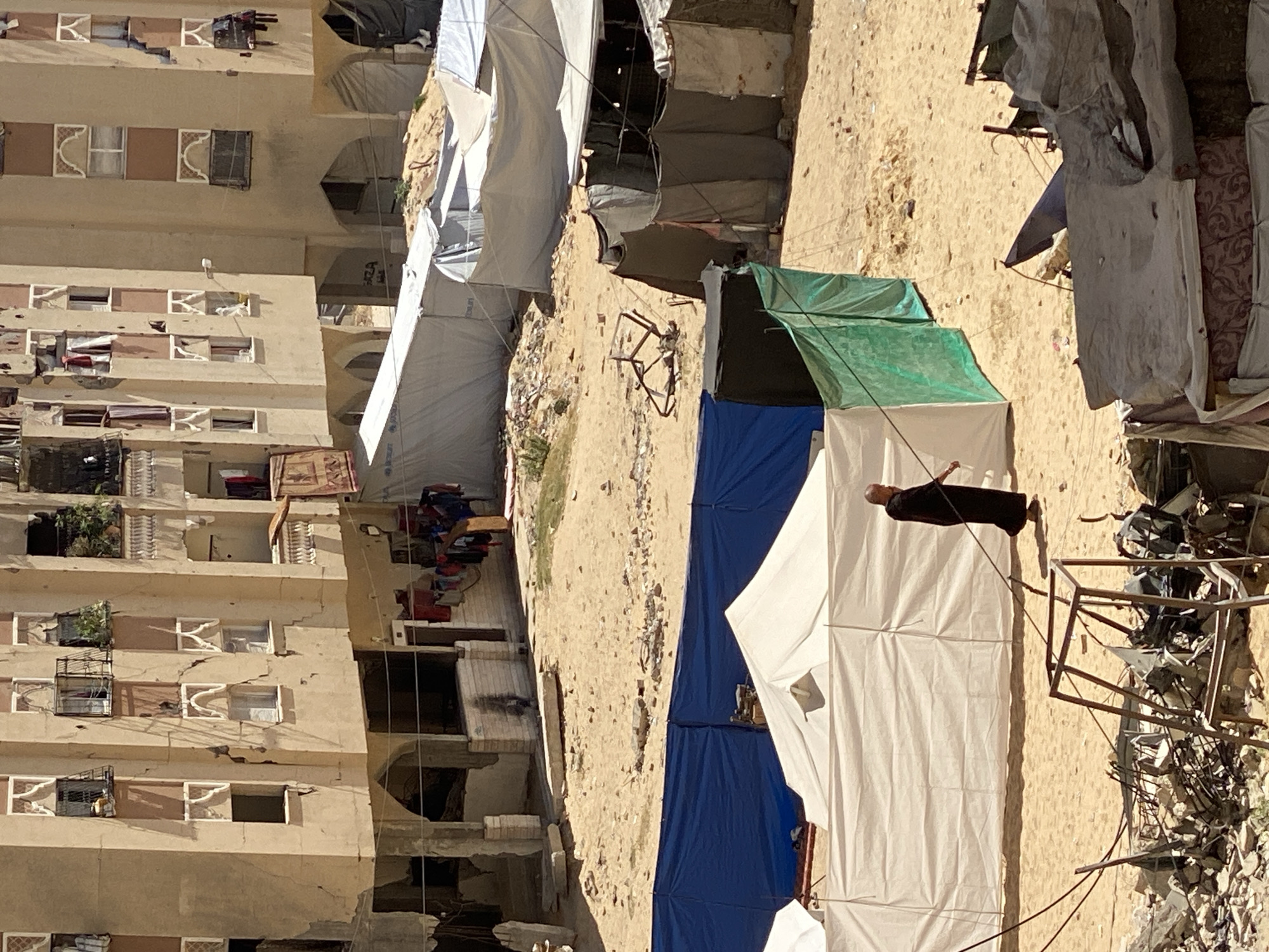 Daily life documented amid damaged buildings in Khan Yunis