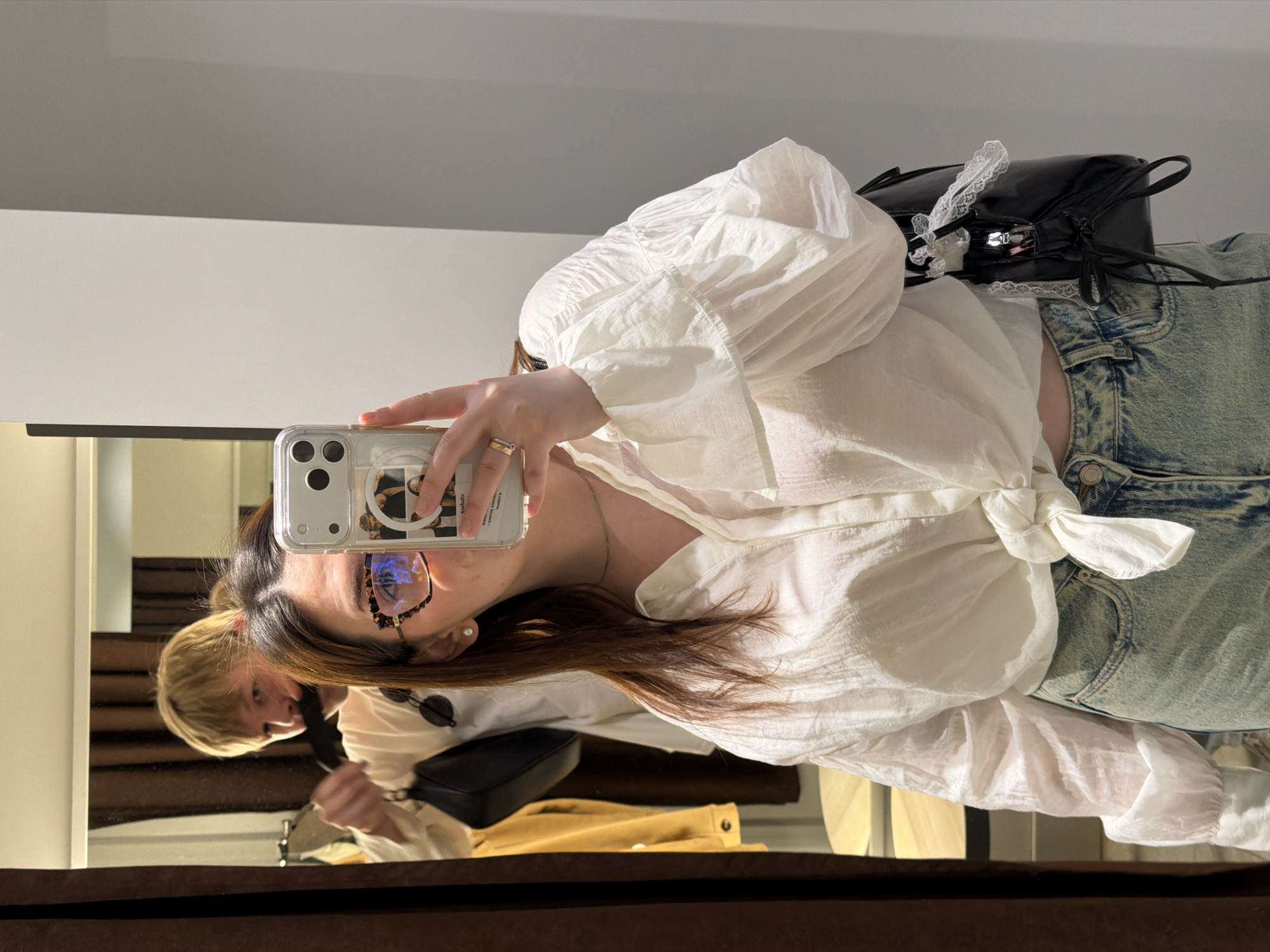 Woman takes mirror selfie in Izhevsk, Russia