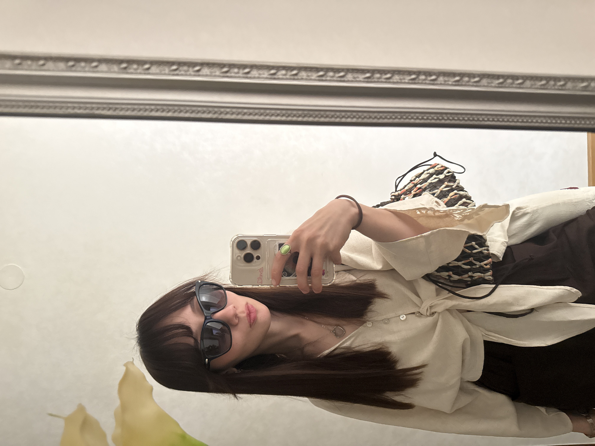 Woman takes mirror selfie in Novi Sad apartment