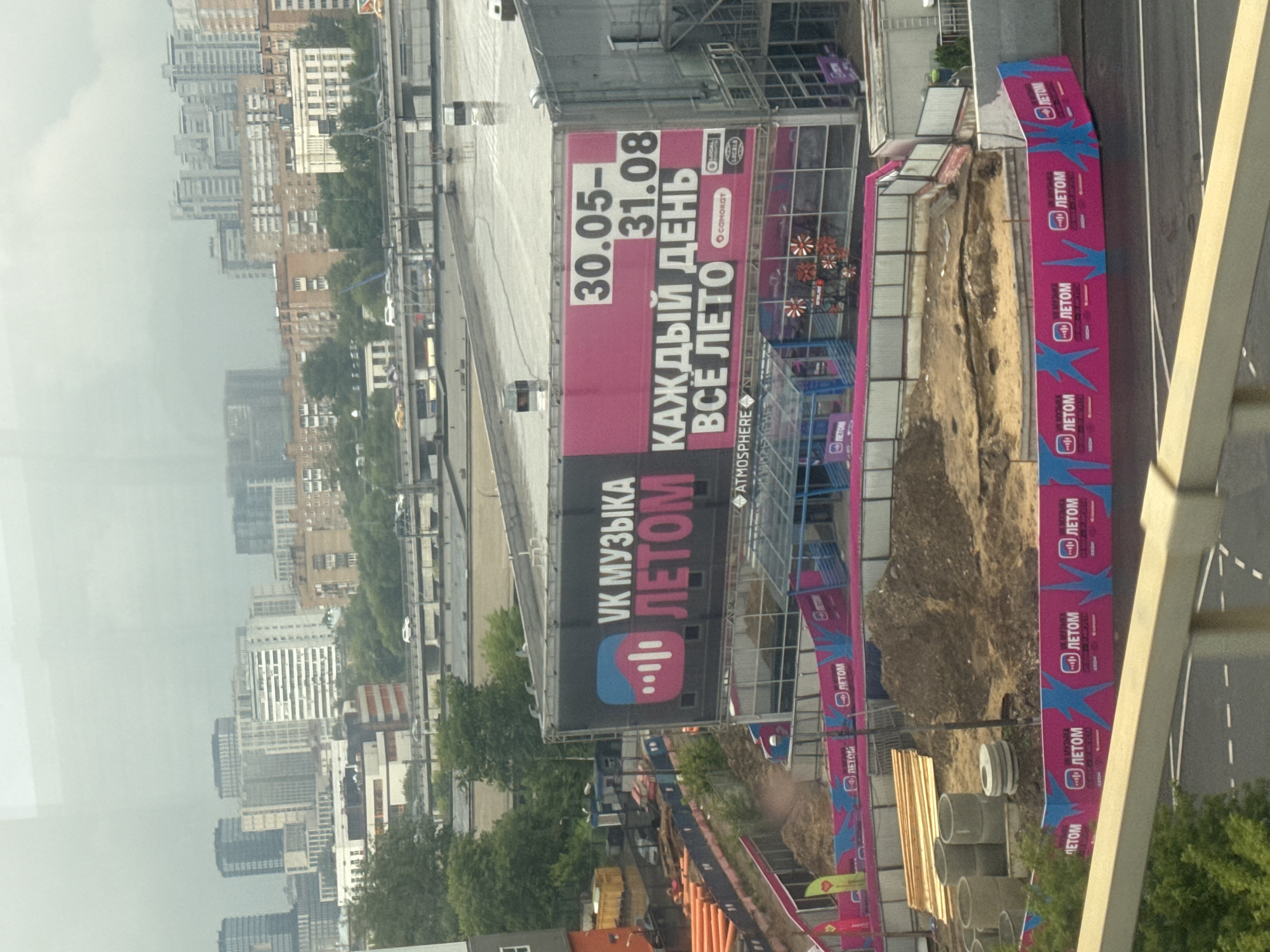 Train ride through Moscow's modern cityscape, July 2026