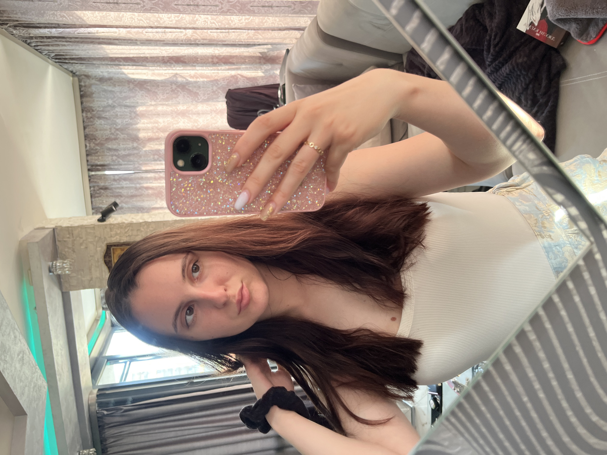 Woman documents quiet afternoon selfies and reading in Pleven