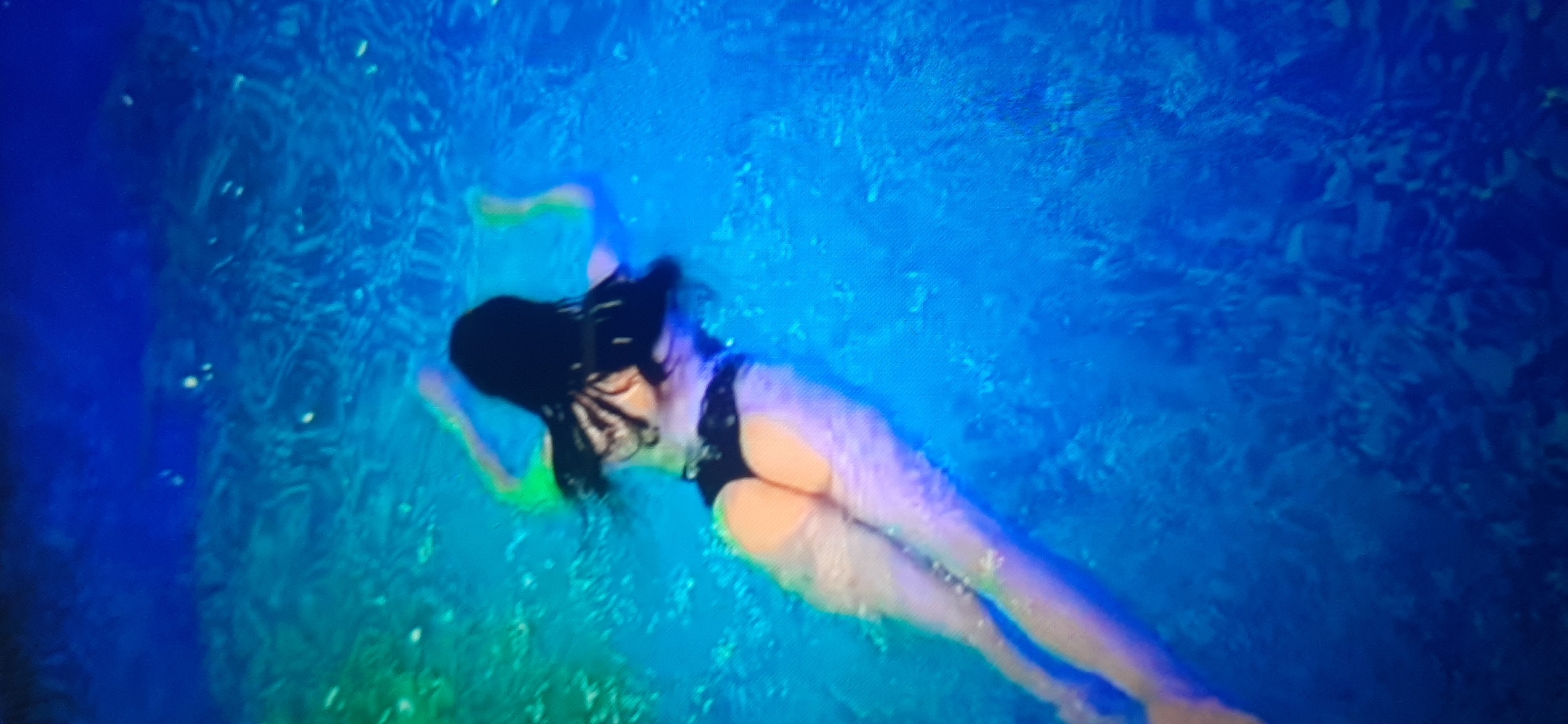 Pool session shot from above and below the water