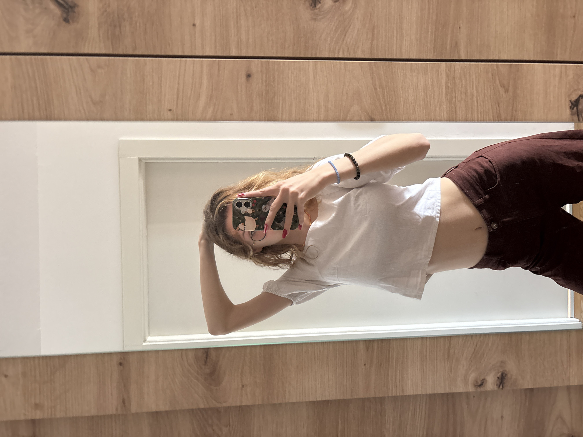 Woman takes multiple selfies in Kragujevac, Serbia