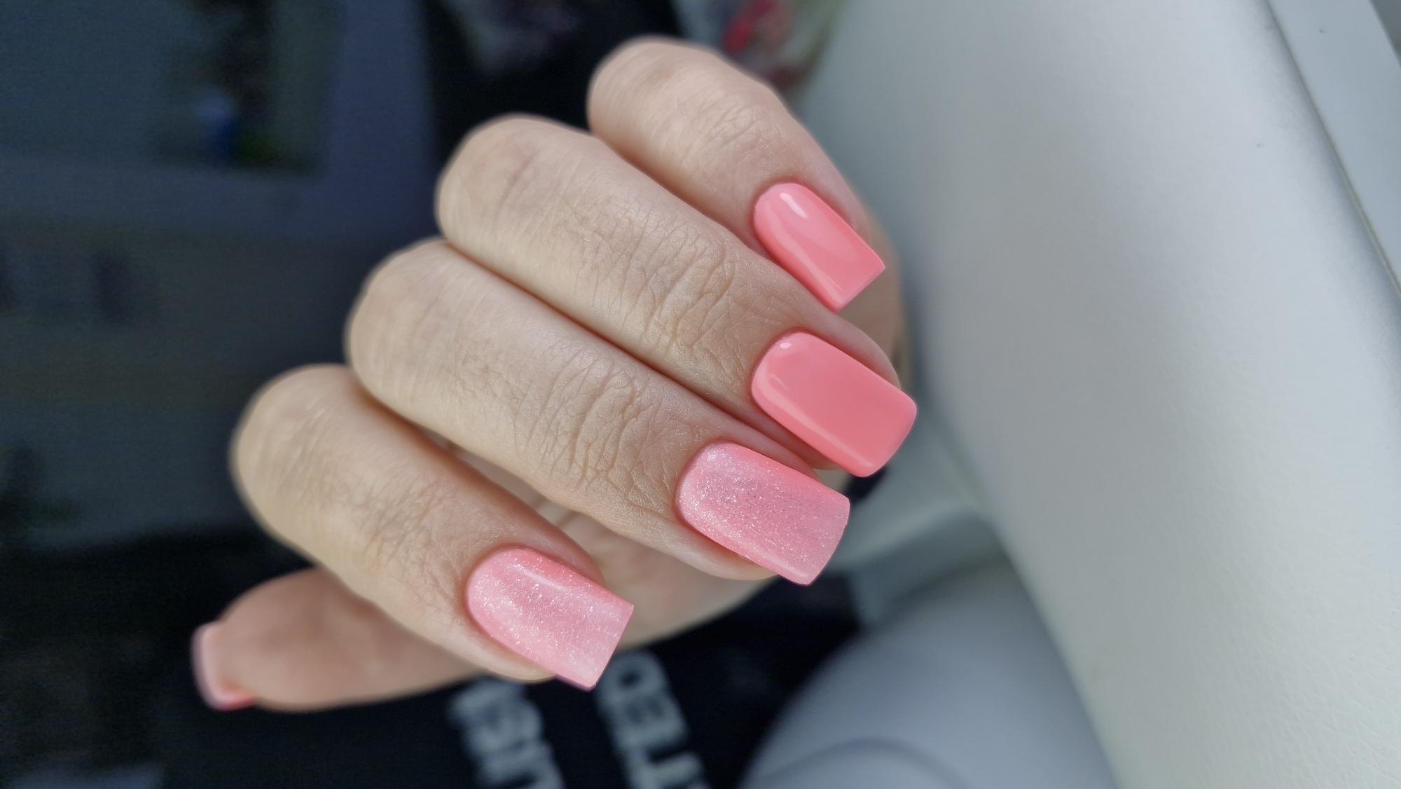 Personal moments captured in Otchor: manicured nails, woman with prop