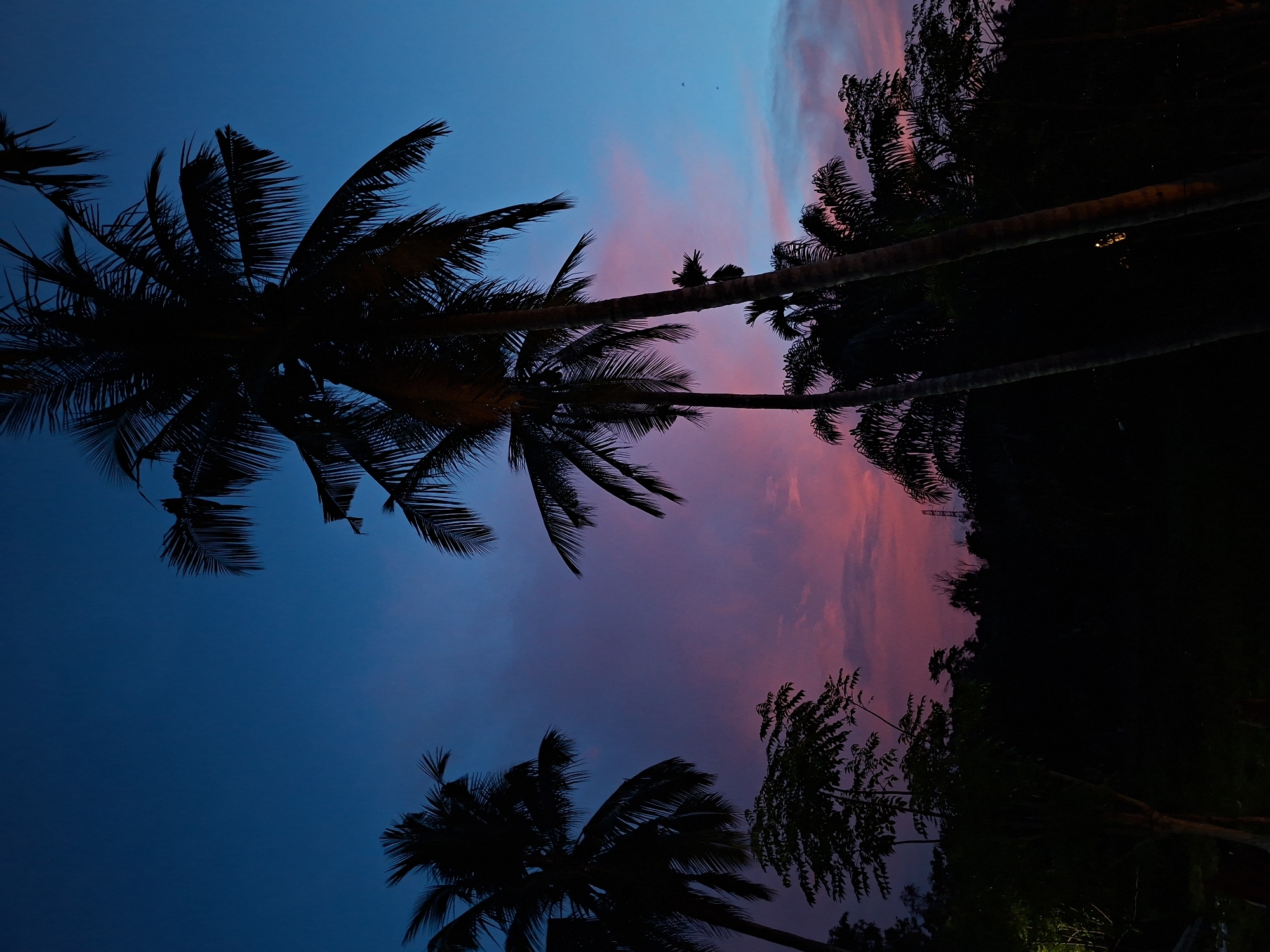 Twilight sky creates vibrant display over Lhokseumawe, Indonesia