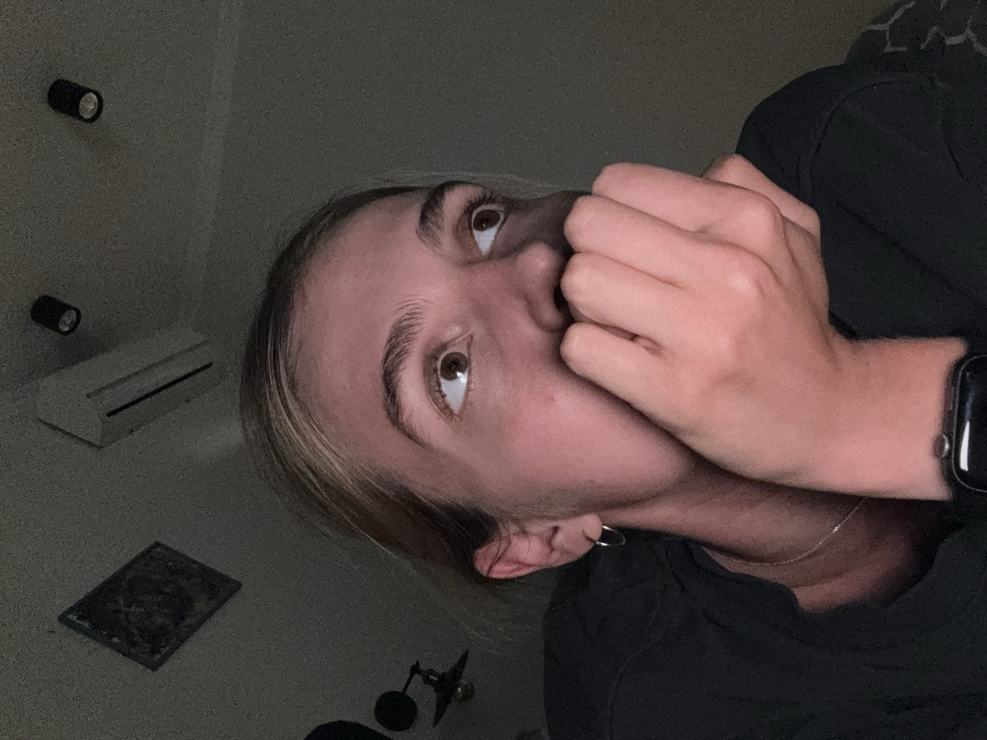 Fair-skinned individual photographed across two hours, multiple indoor poses