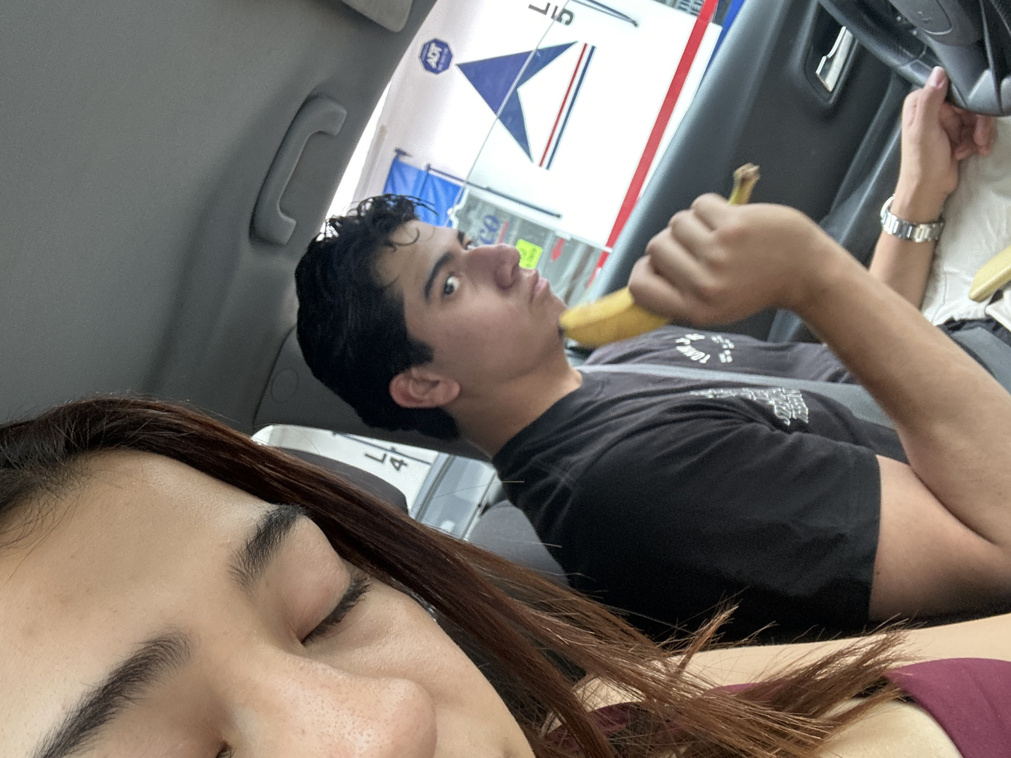 Passengers photograph themselves inside car in Puebla, Mexico