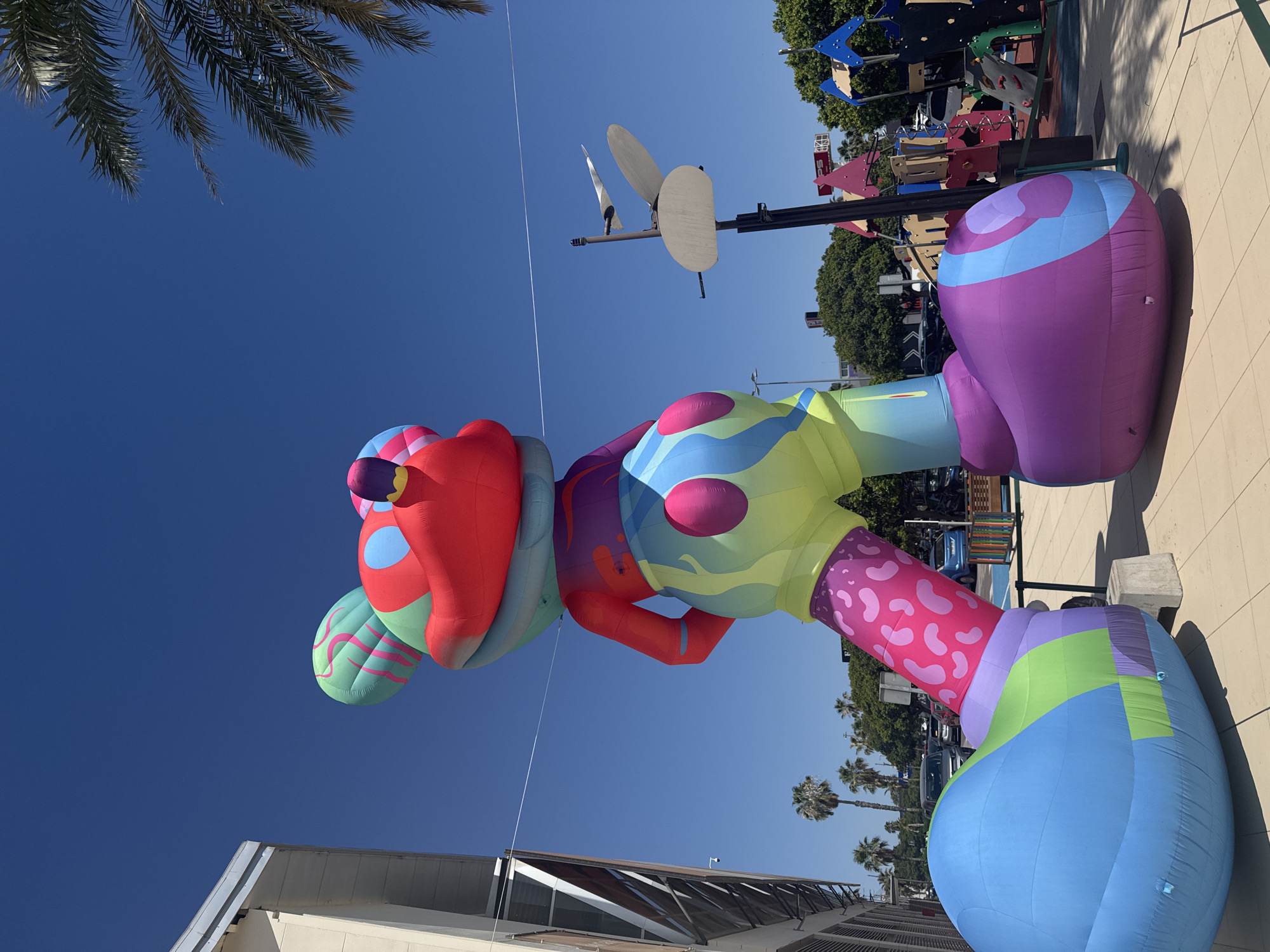 Colorful inflatable cartoon character on plaza in Aldaia