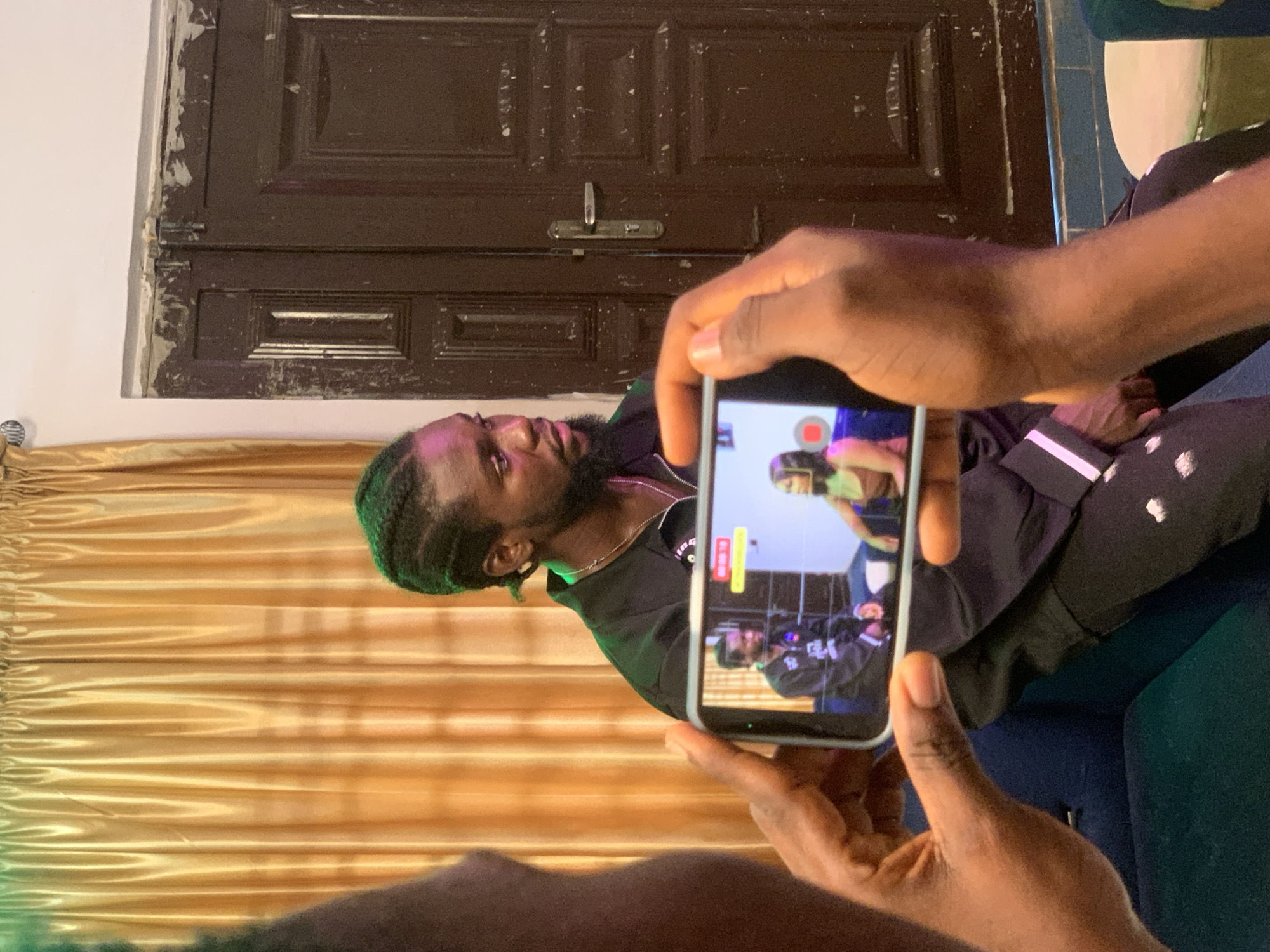 Behind-the-scenes of a video shoot in Ikorodu, Nigeria