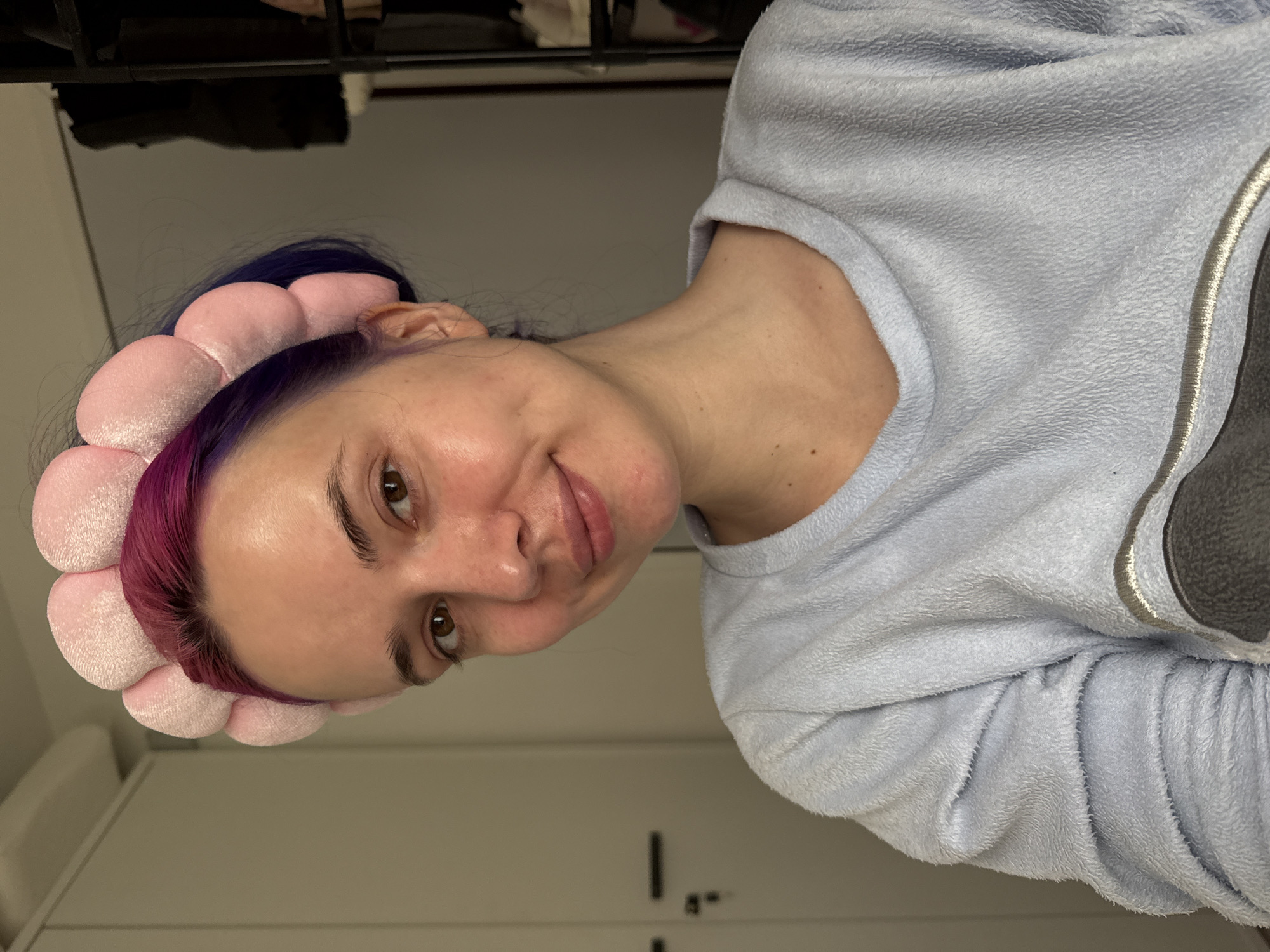 Morning selfies capture colorful hair, cozy outfit in Zagreb home