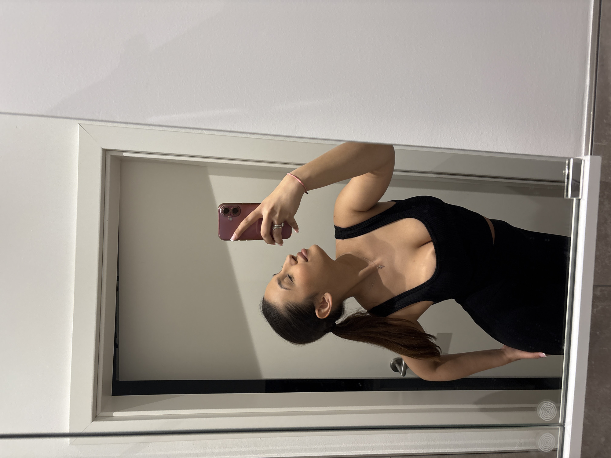 Woman takes selfies indoors in Mönchengladbach, Germany