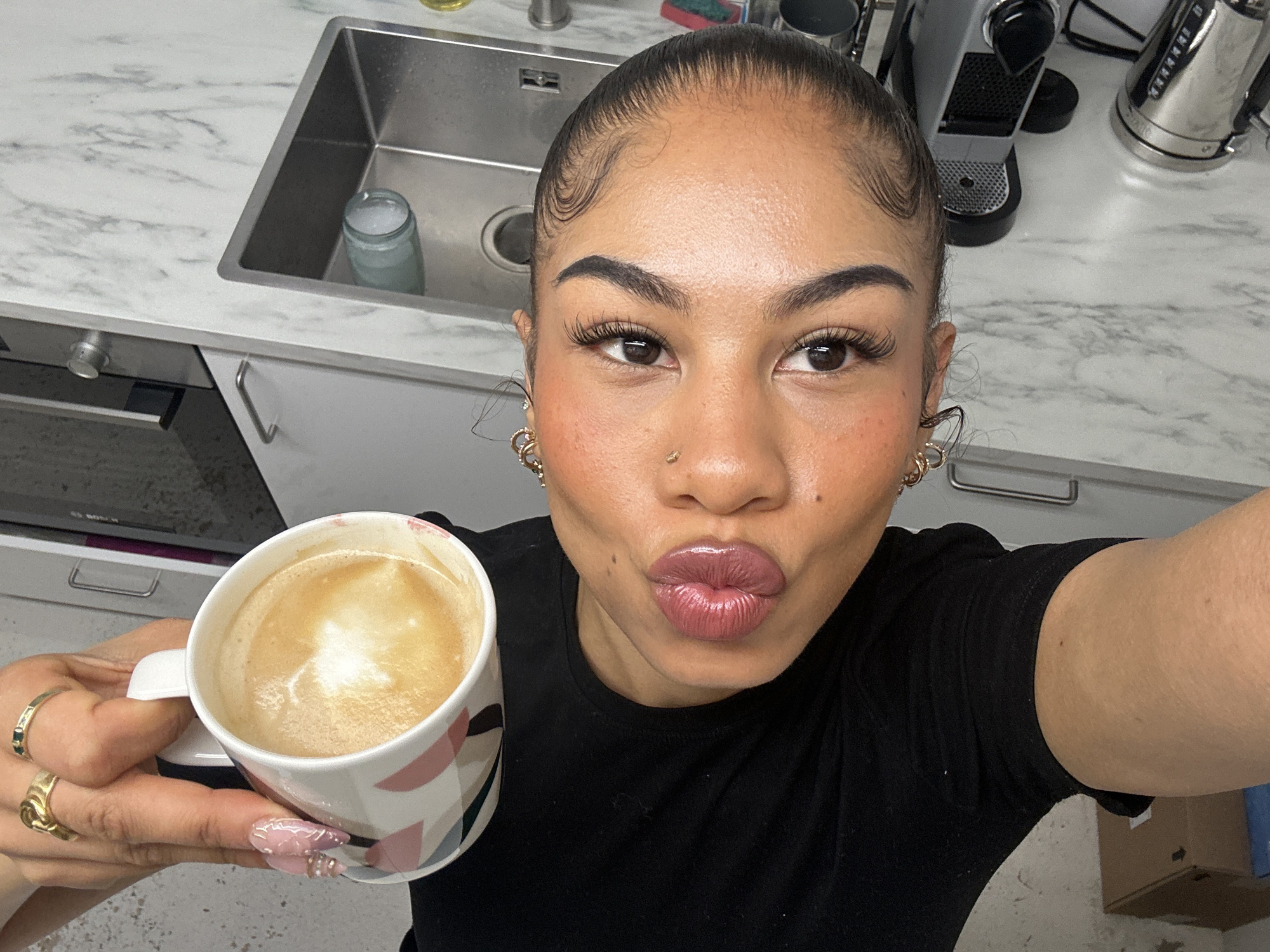 Woman documents London morning with kitchen selfie, street photography