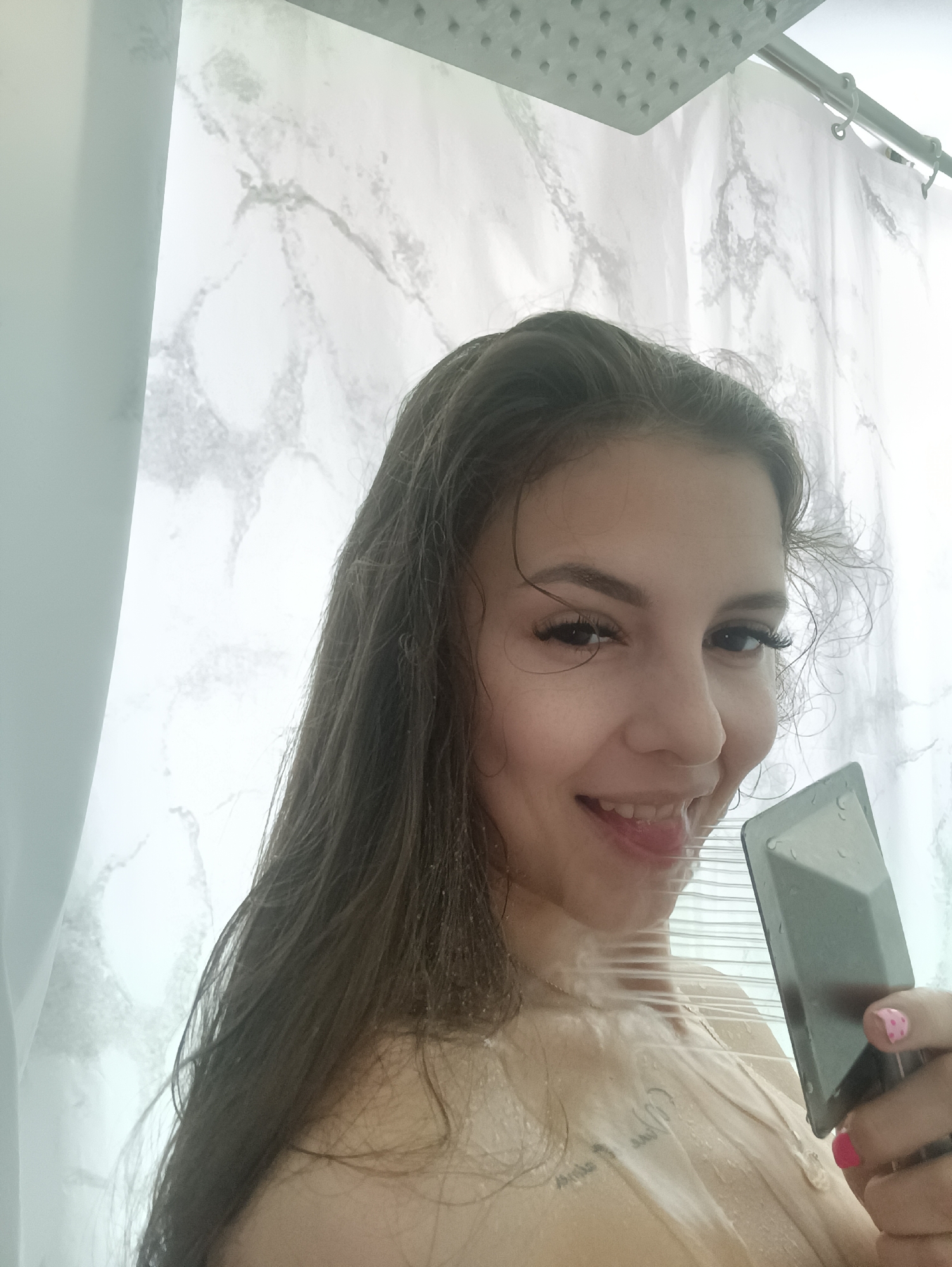 Woman documented during morning shower routine with various products