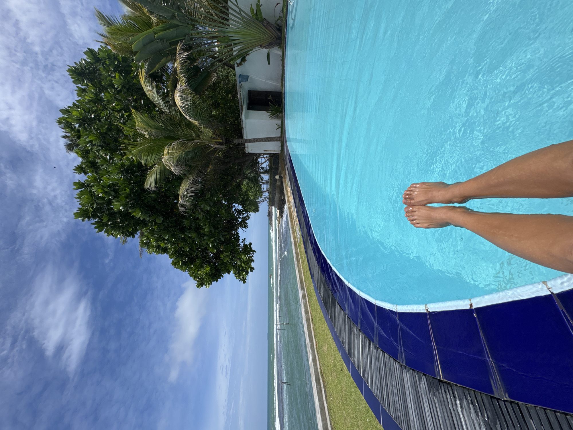 Lazy resort morning by the pool and ocean, Goviyapana