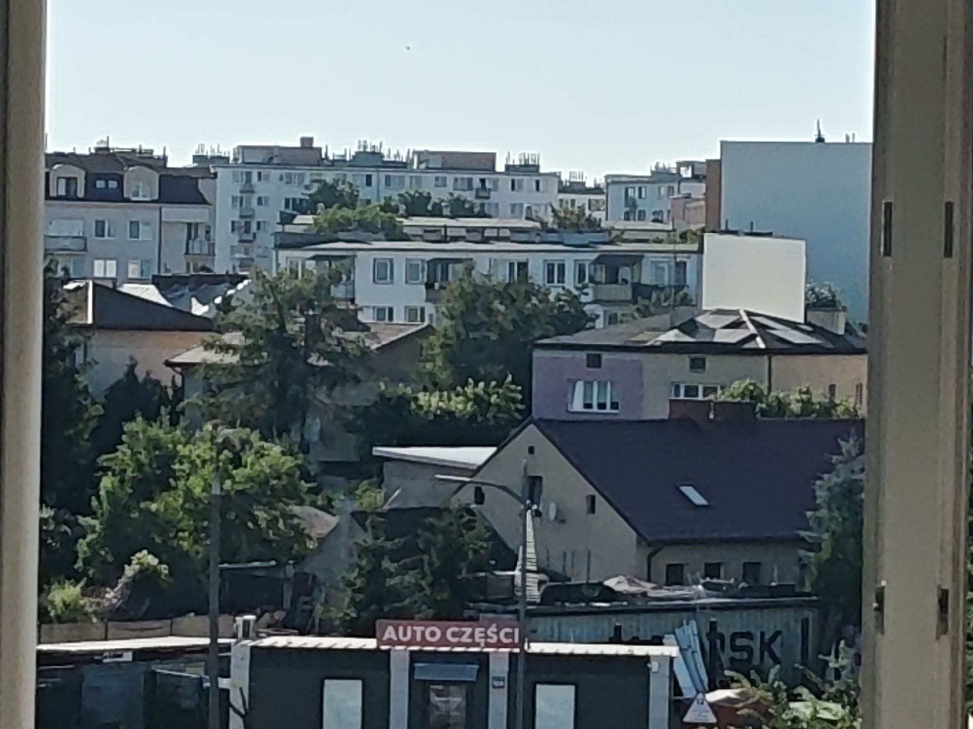 Mixed urban streetscape in Mława, Poland