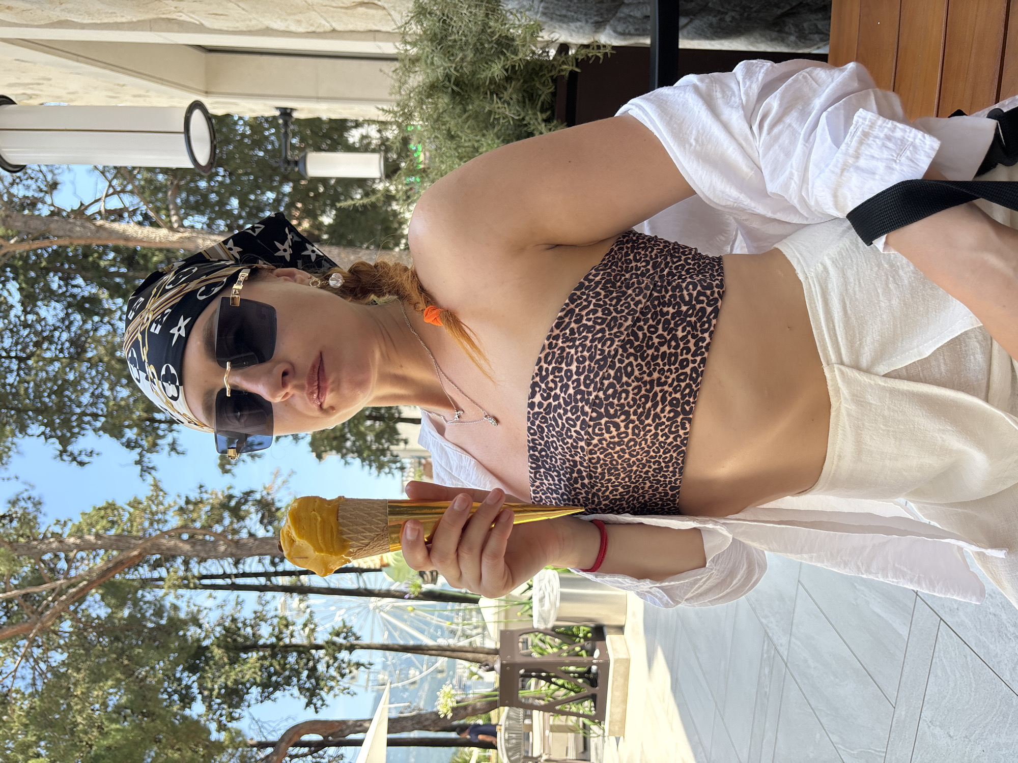 Tourist enjoys ice cream and pizza in Budva Montenegro