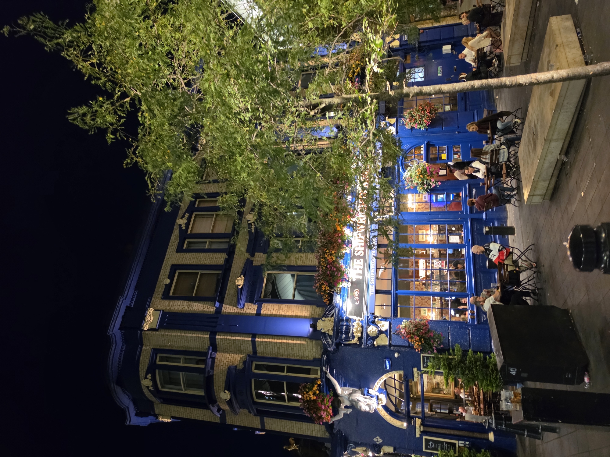The Shipwright's Arms lit up on a London night