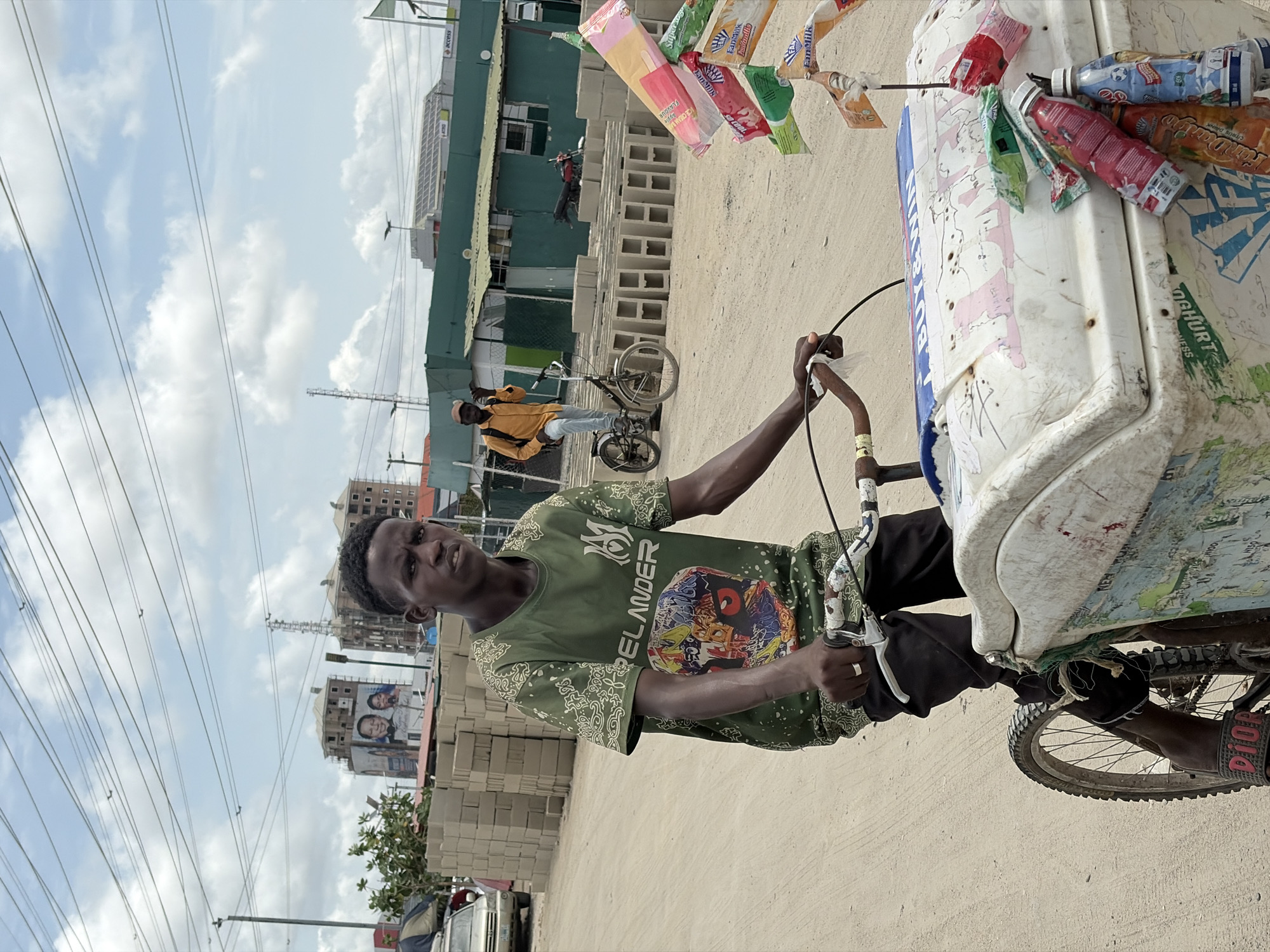 Ice cream vendor operates bicycle cart in Igboefon, Nigeria