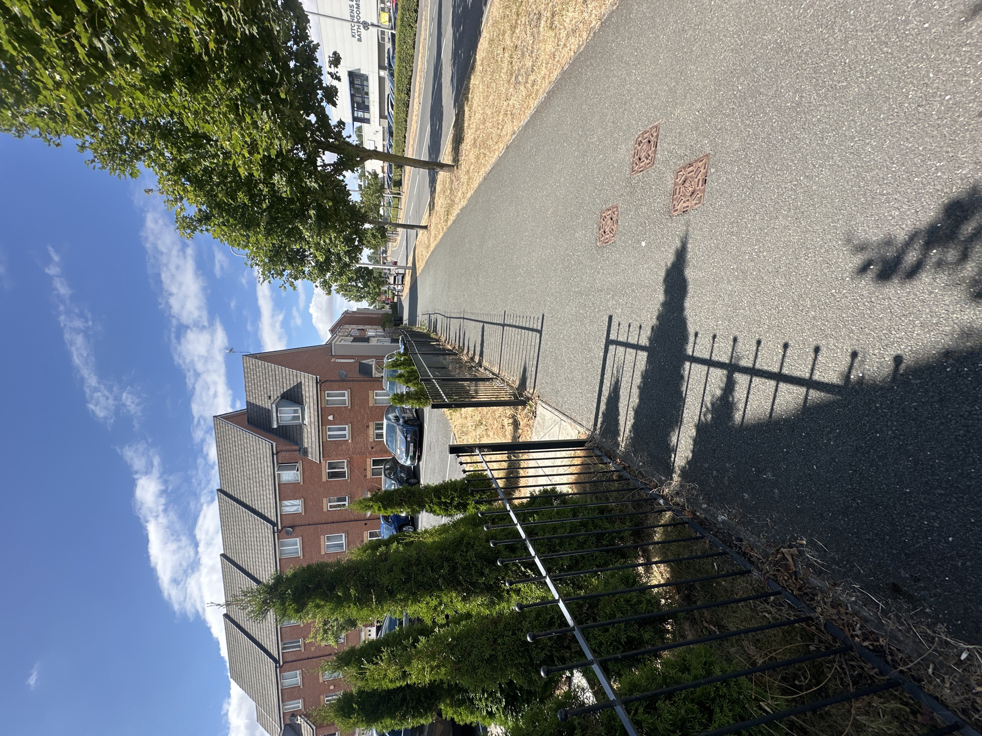 Quiet residential street on a sunny day in Rugby