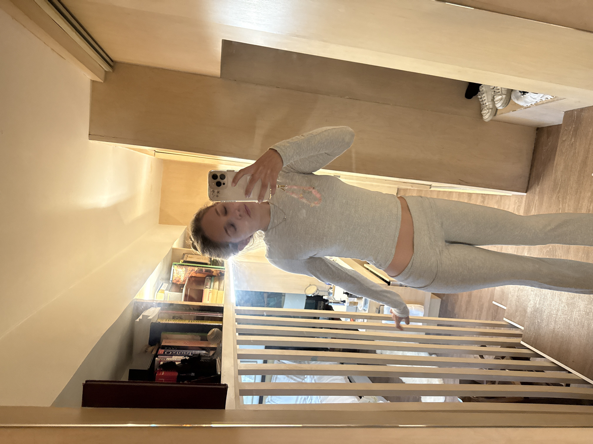 Mirror selfie series in a Mexico City apartment, gray matching set