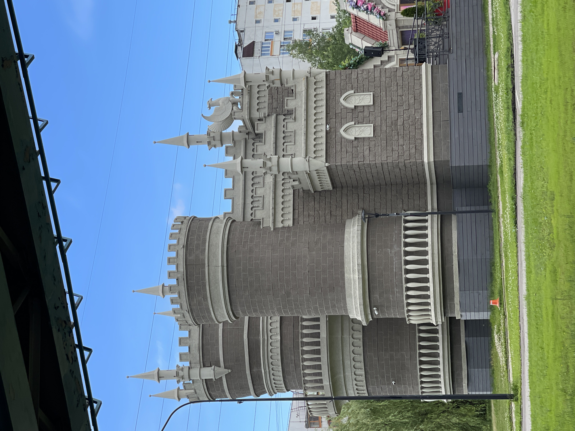 Strolling past a fairytale-style building on a Moscow promenade